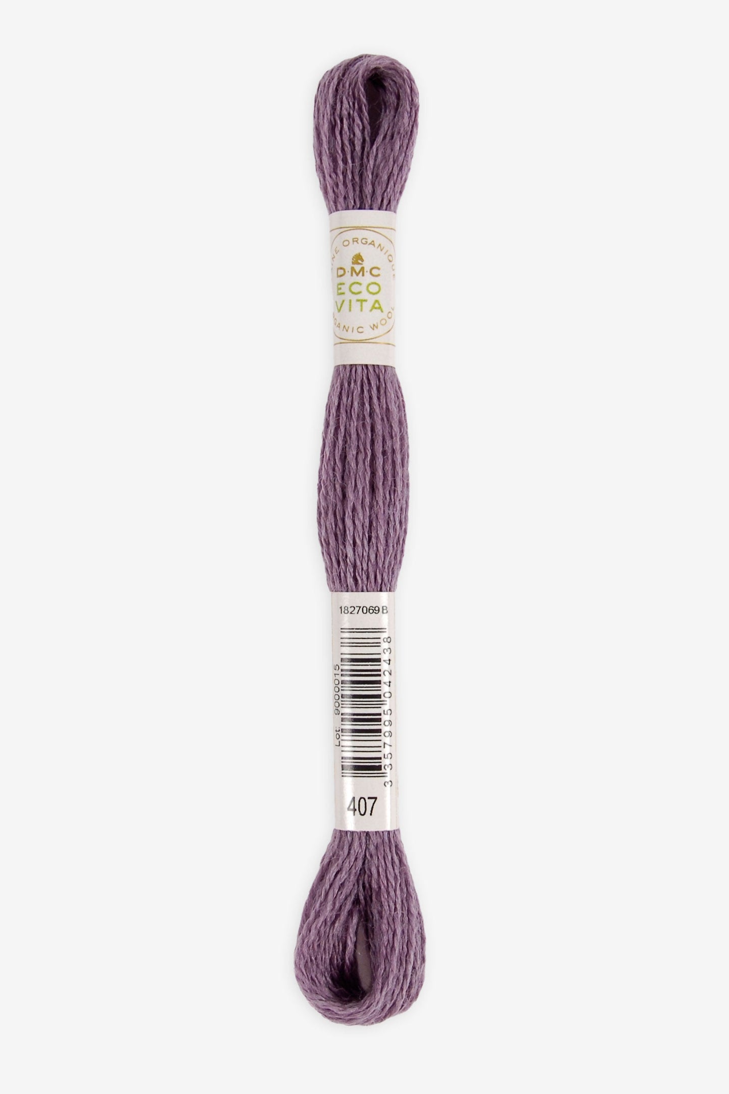 Single skein of Eco Vita Crewel Wool thread from DMC in color #407 against a white background