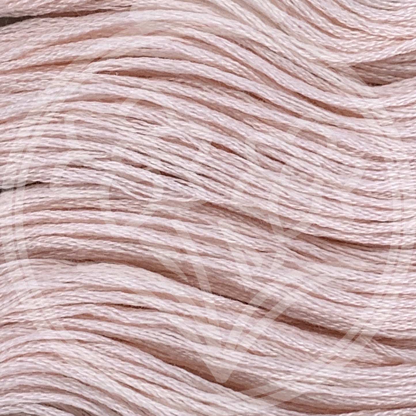 Closeup of multiple skeins, with a logo watermark