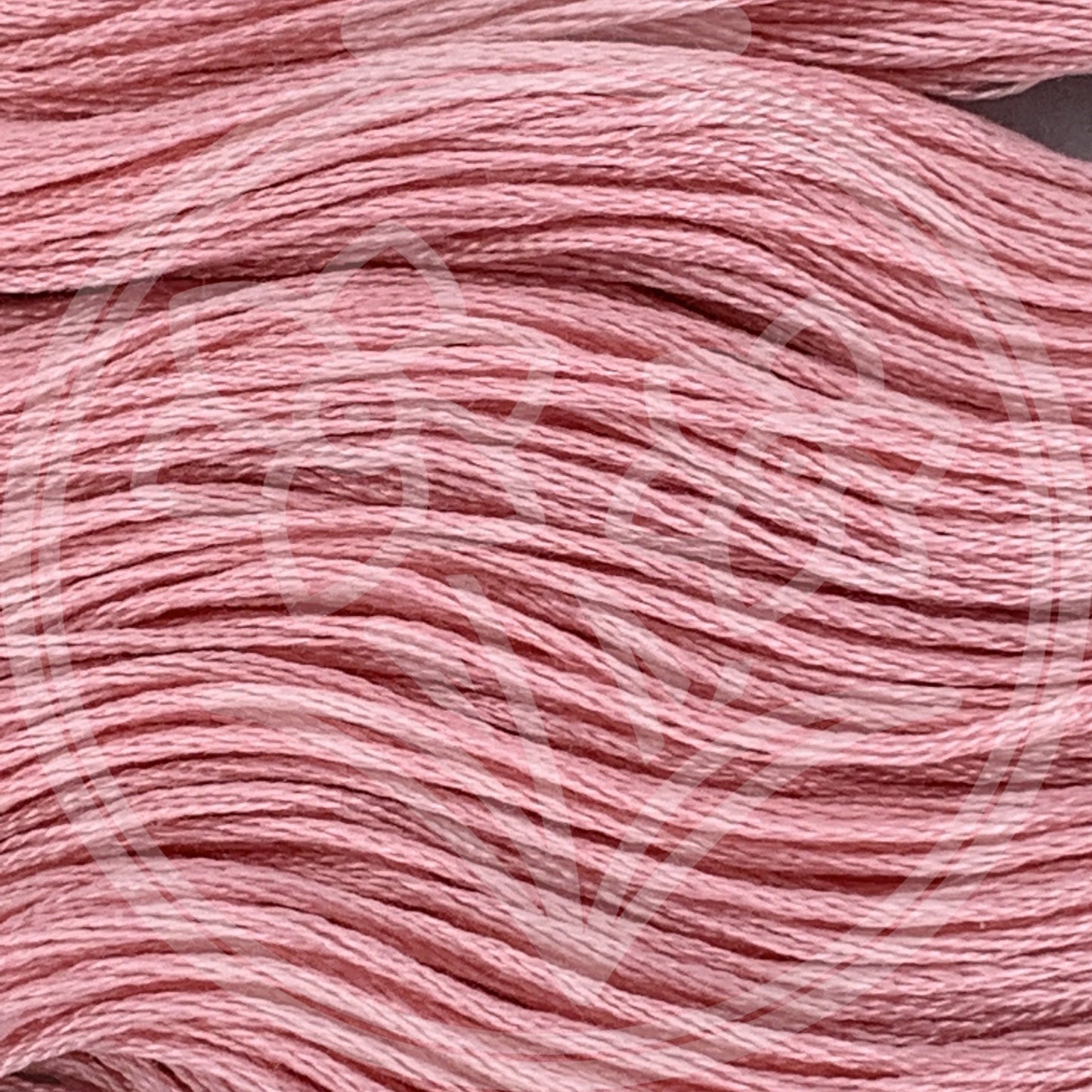 Closeup of multiple skeins, with a logo watermark