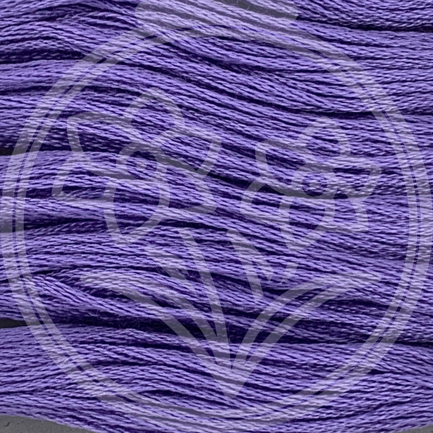 Closeup of multiple skeins, with a logo watermark