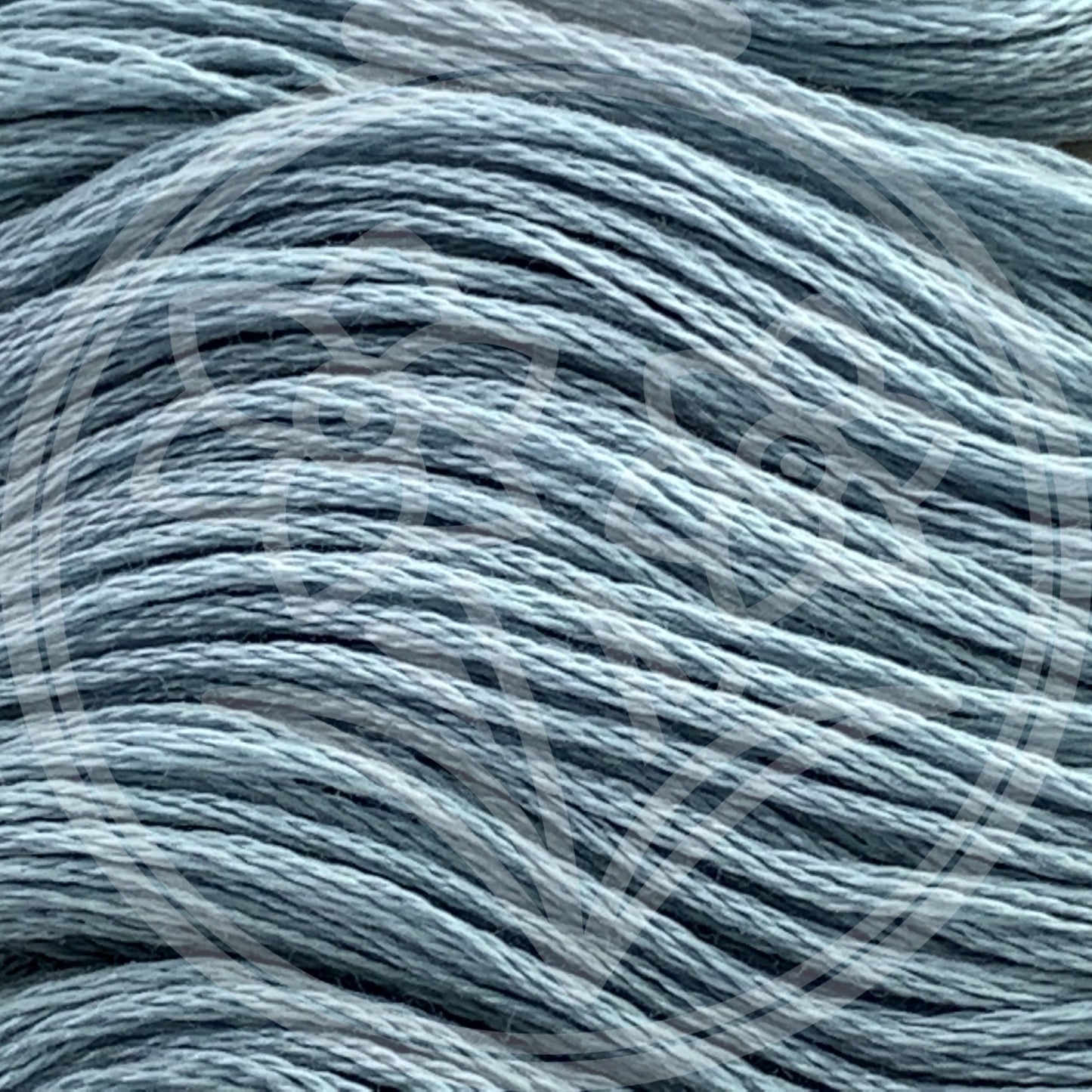 Closeup of multiple skeins, with a logo watermark