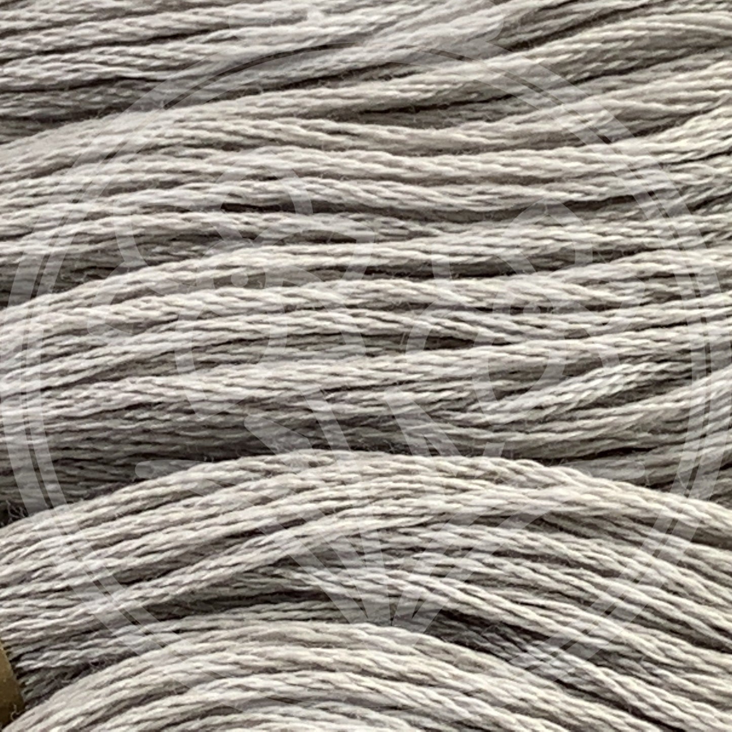 Closeup of multiple skeins, with a logo watermark
