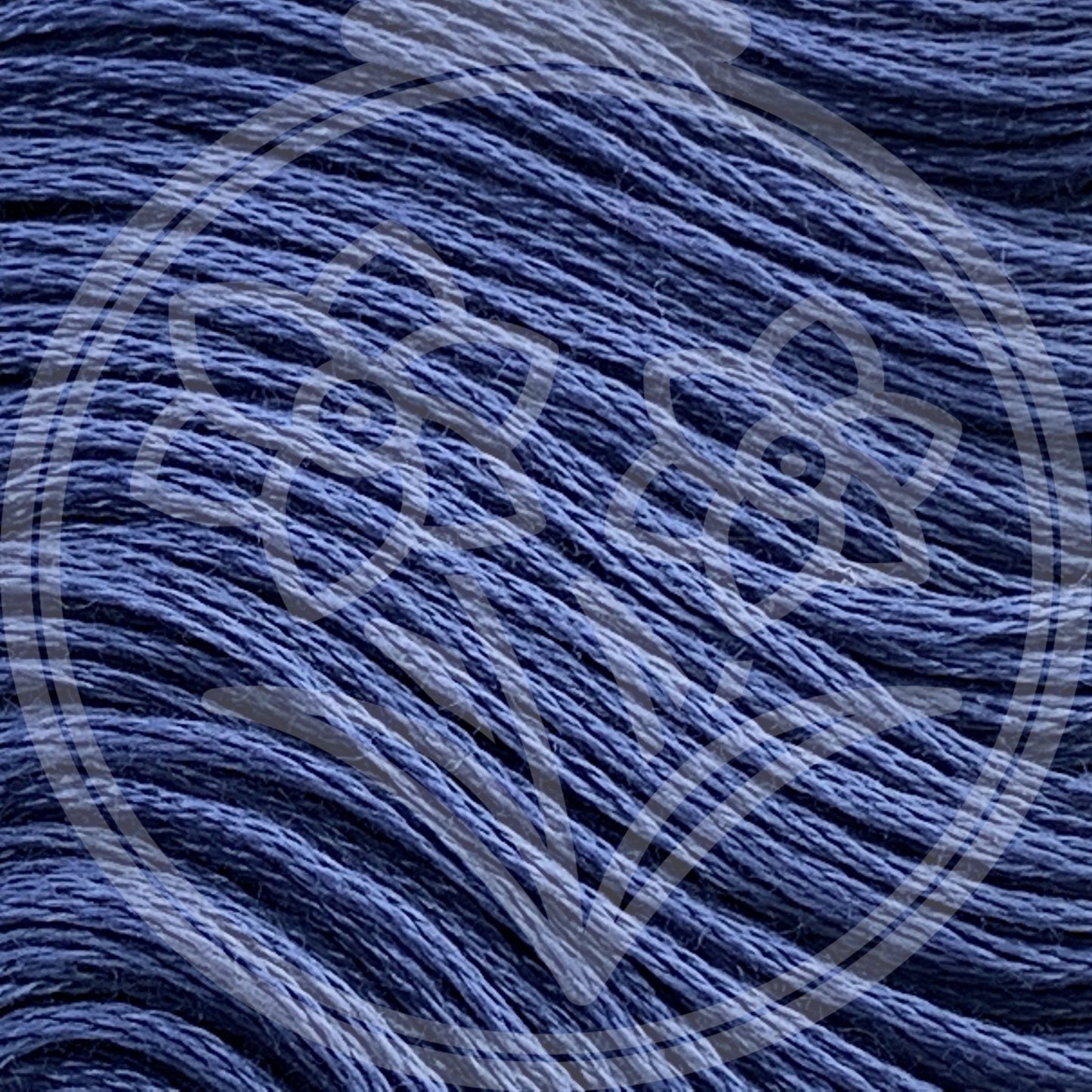 Closeup of multiple skeins, with a logo watermark