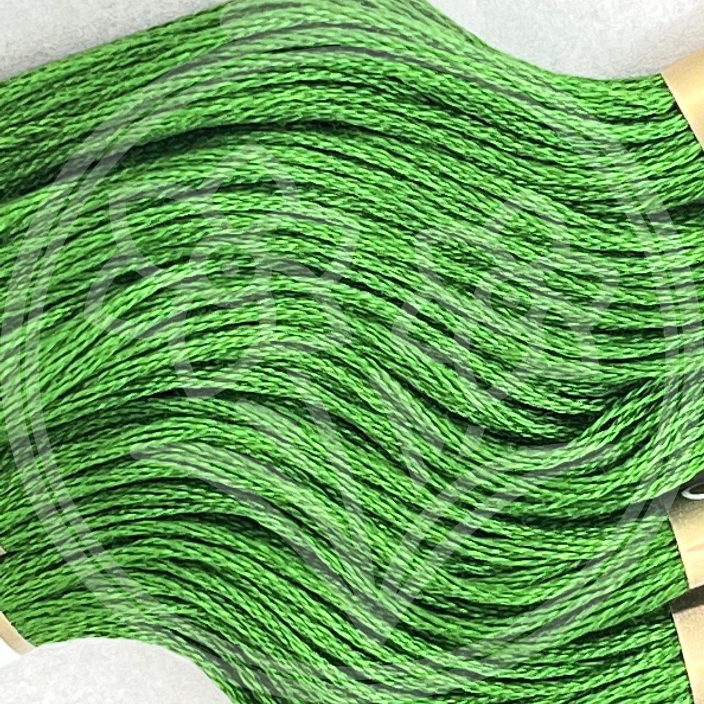 Closeup of multiple skeins, with a logo watermark