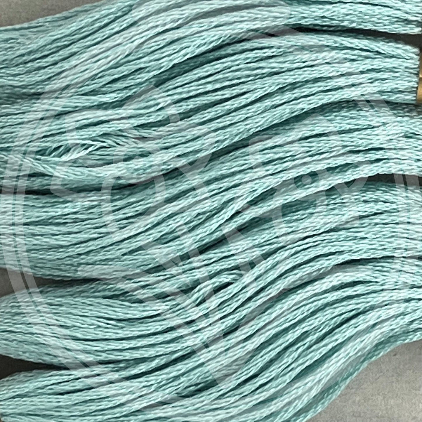 Closeup of multiple skeins, with a logo watermark