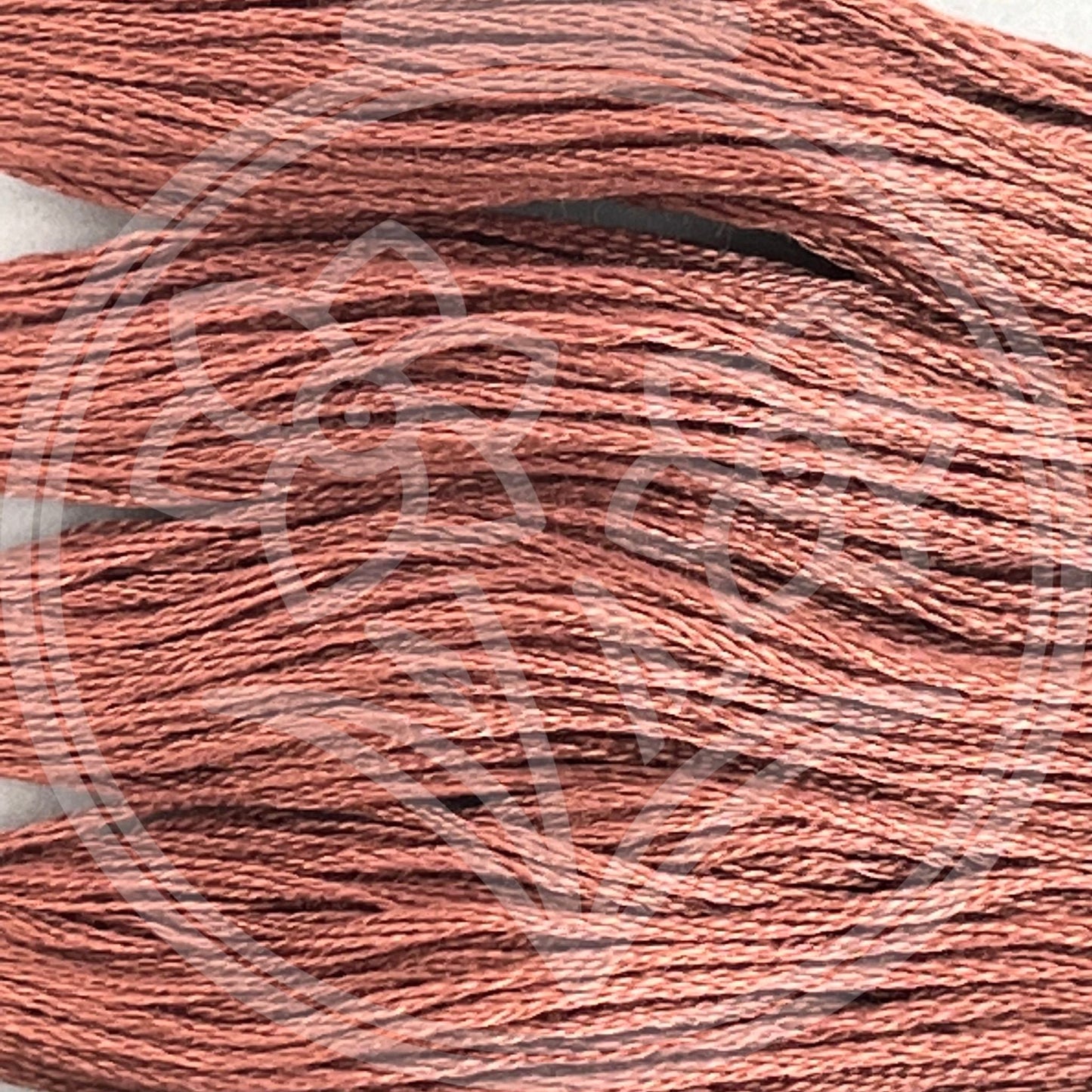 Closeup of multiple skeins, with a logo watermark