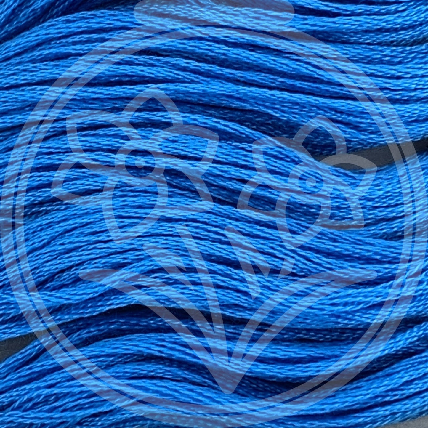 Closeup of multiple skeins, with a logo watermark