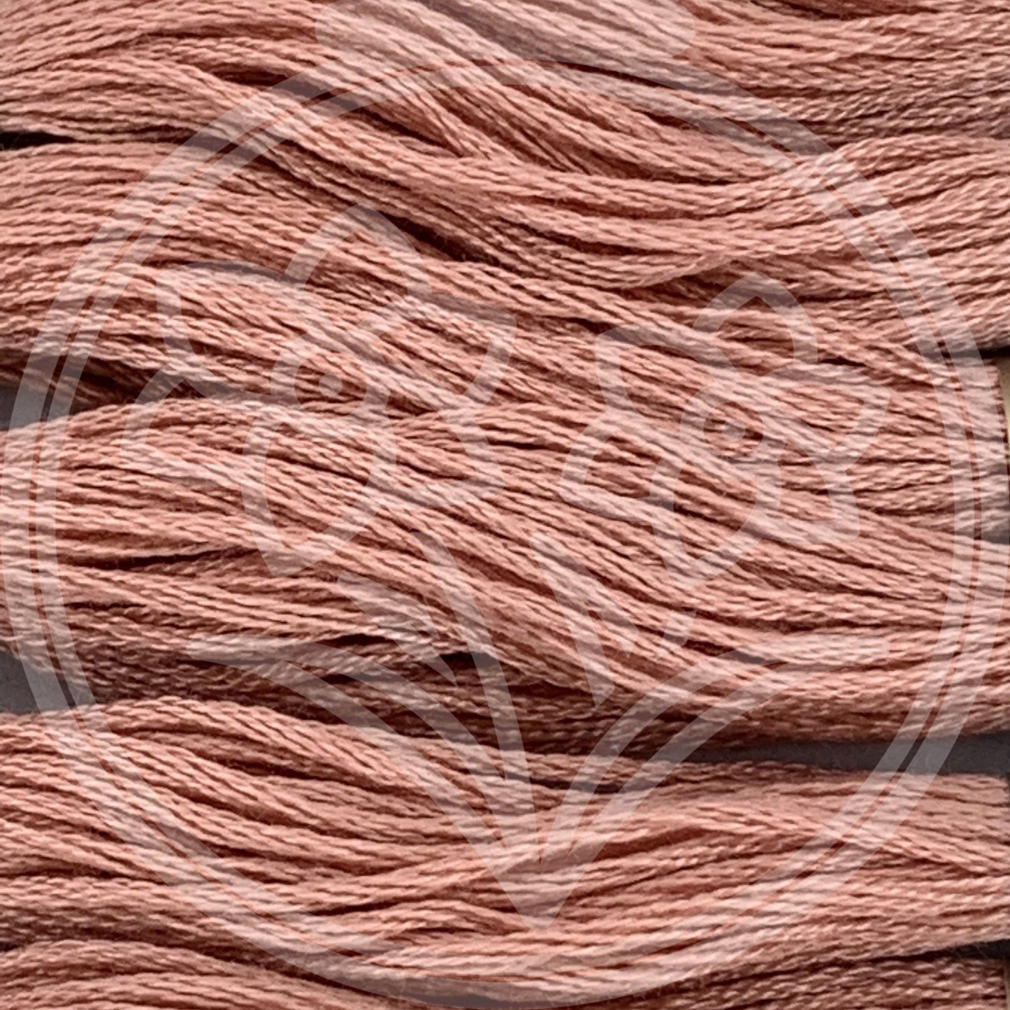 Closeup of multiple skeins, with a logo watermark