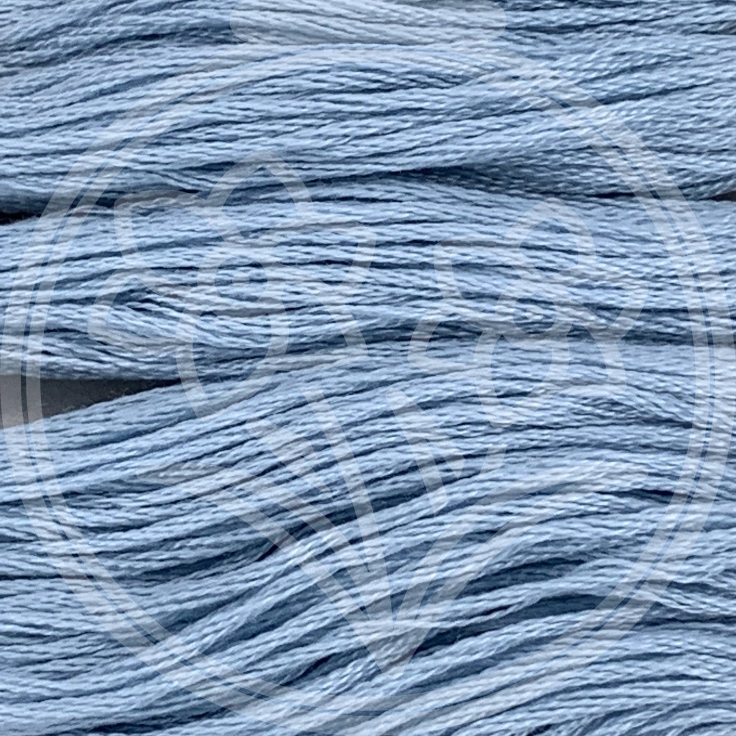 Closeup of multiple skeins, with a logo watermark