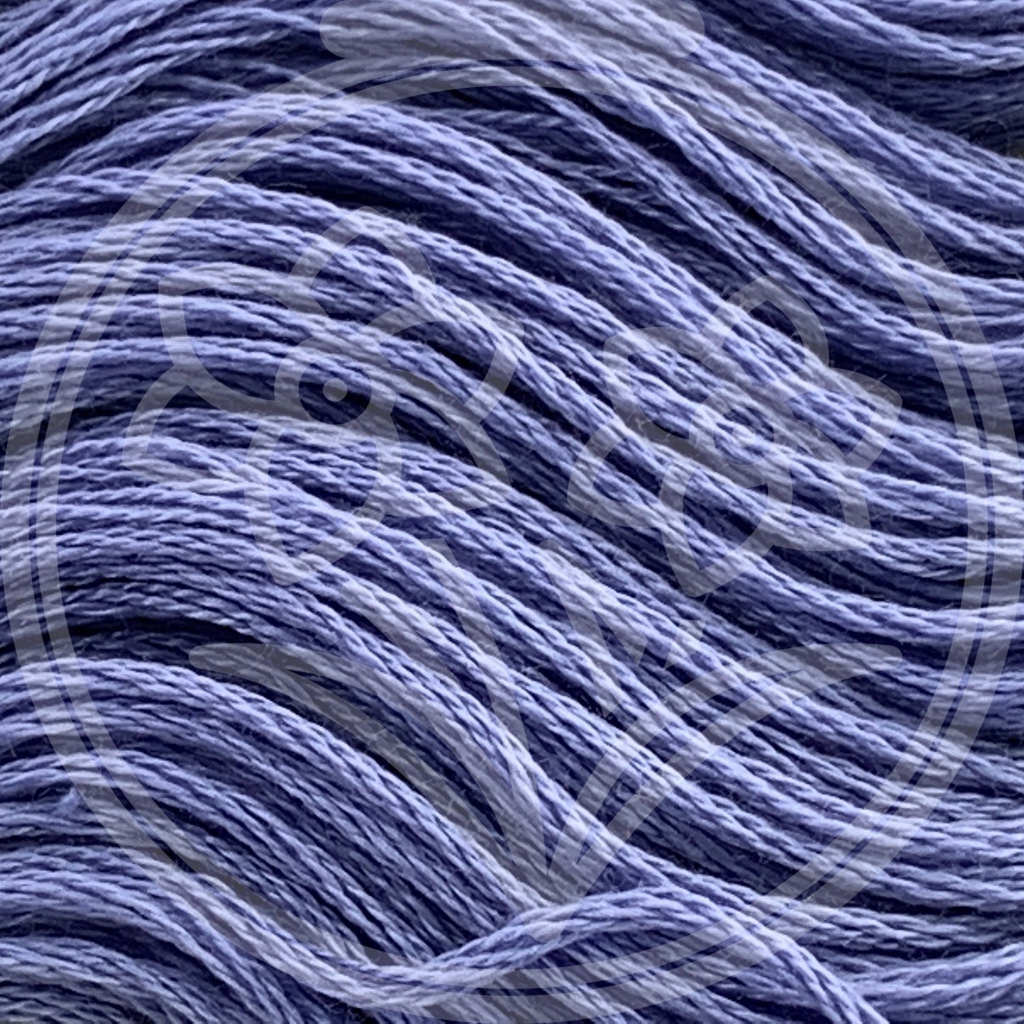 Closeup of multiple skeins, with a logo watermark