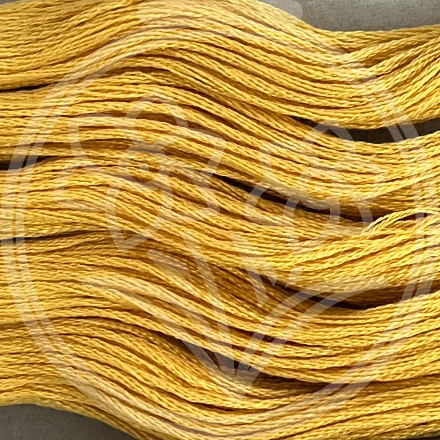 Closeup of multiple skeins, with a logo watermark