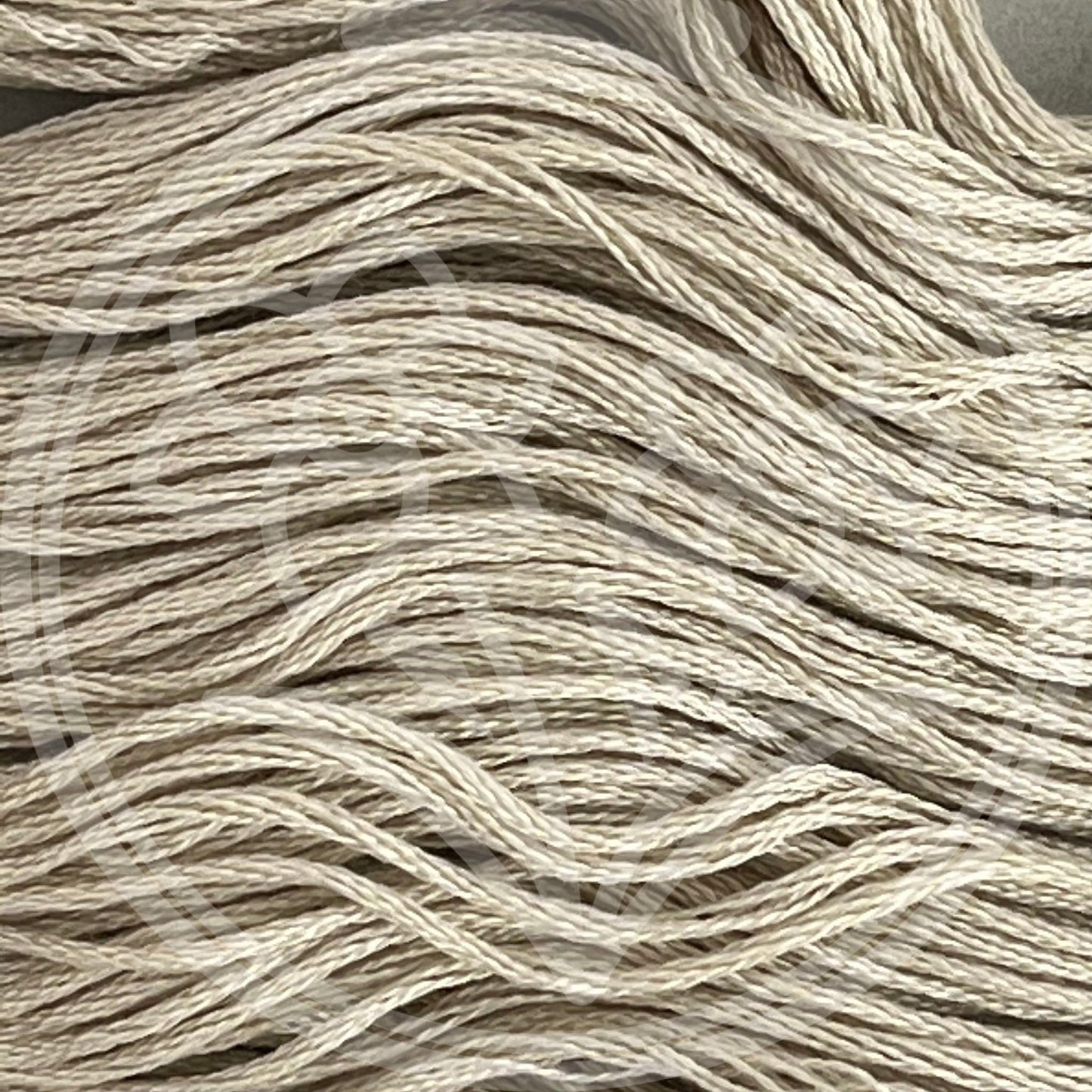 Closeup of multiple skeins, with a logo watermark