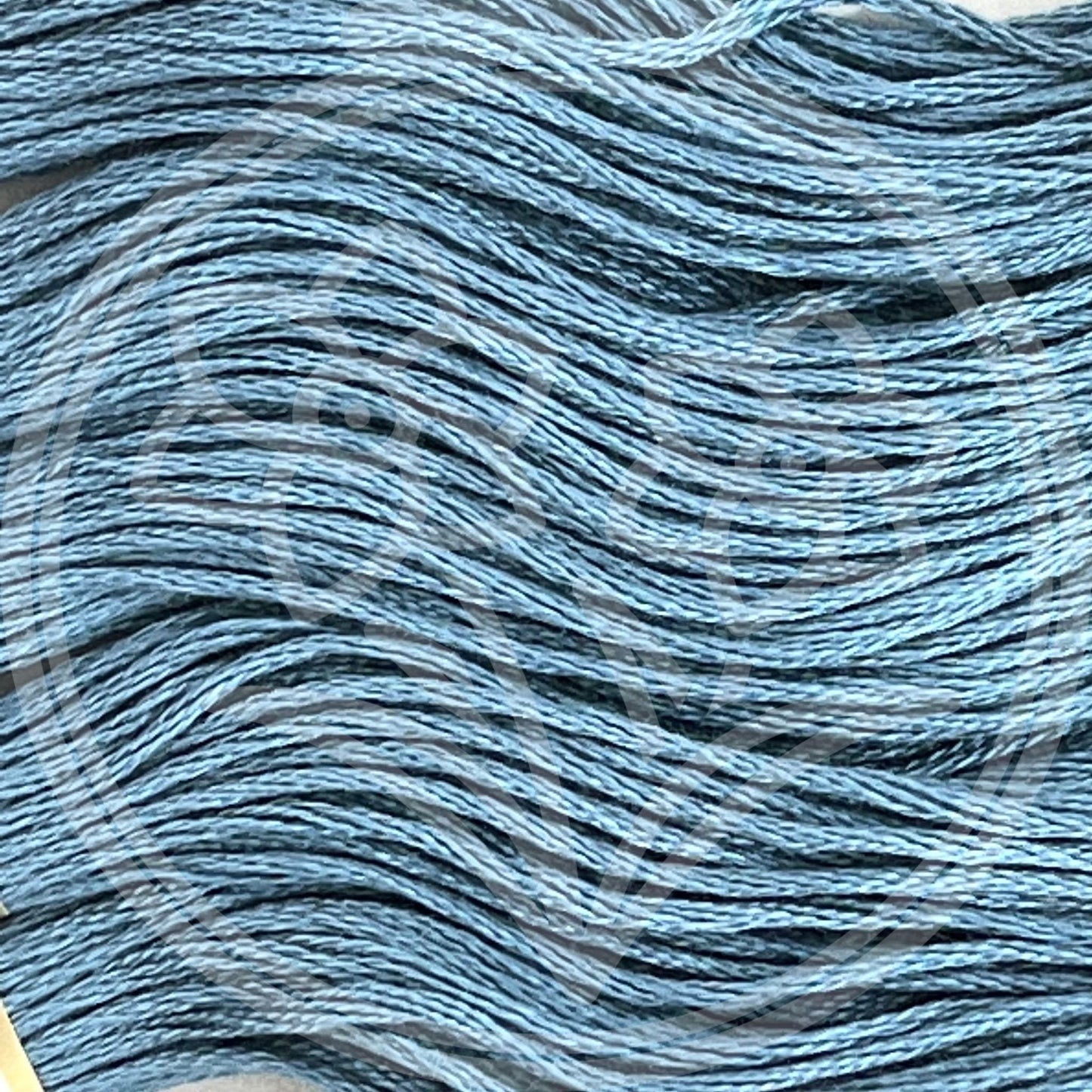 Closeup of multiple skeins, with a logo watermark