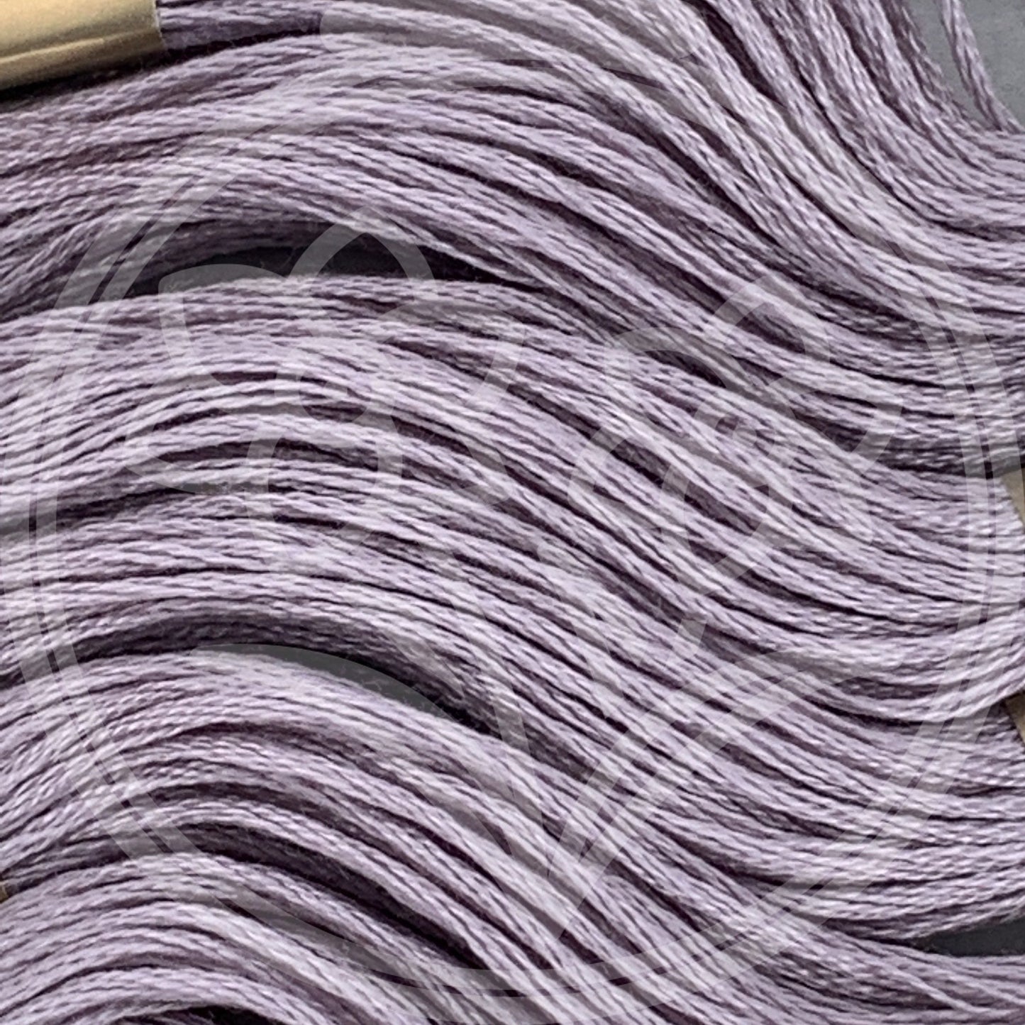 Closeup of multiple skeins, with a logo watermark