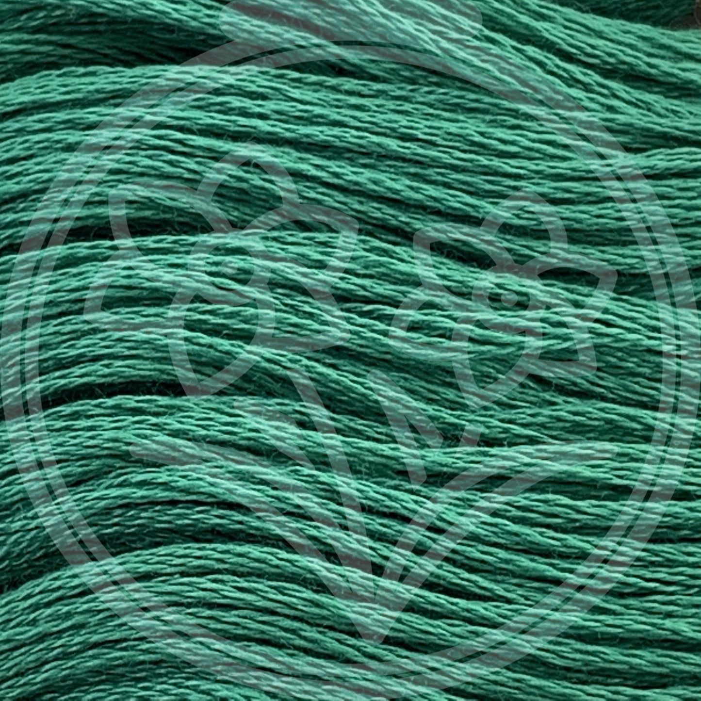 Closeup of multiple skeins, with a logo watermark