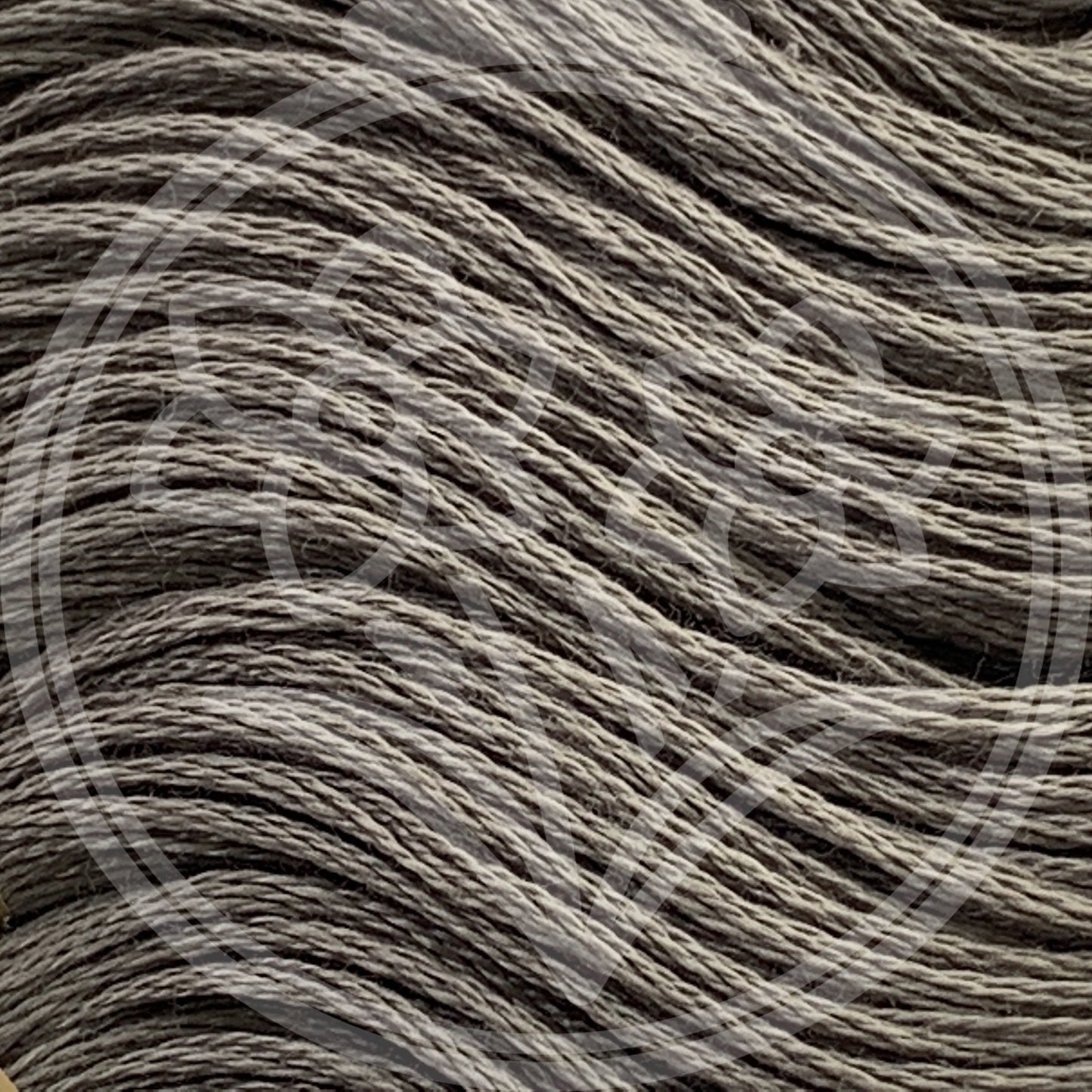 Closeup of multiple skeins, with a logo watermark