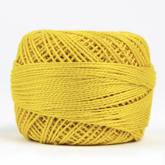 Side view of Perle cotton ball on white background to show color