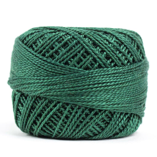 Side view of Perle cotton ball on white background to show color