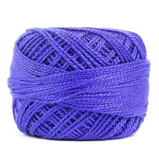 Side view of Perle cotton ball on white background to show color