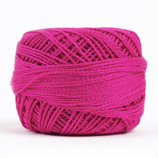 Side view of Perle cotton ball on white background to show color