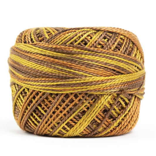 Side view of Perle cotton ball on white background to show color