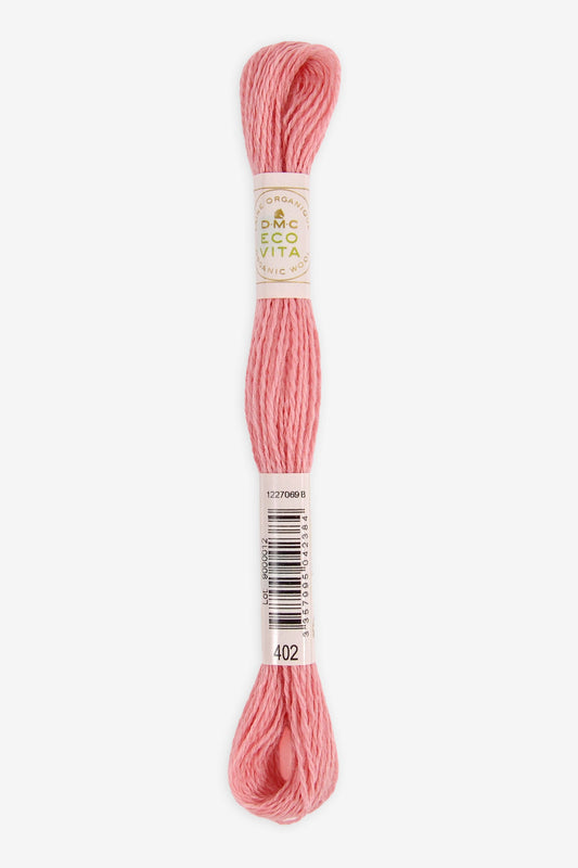 Single skein of Eco Vita Crewel Wool thread from DMC in color #402 against a white background