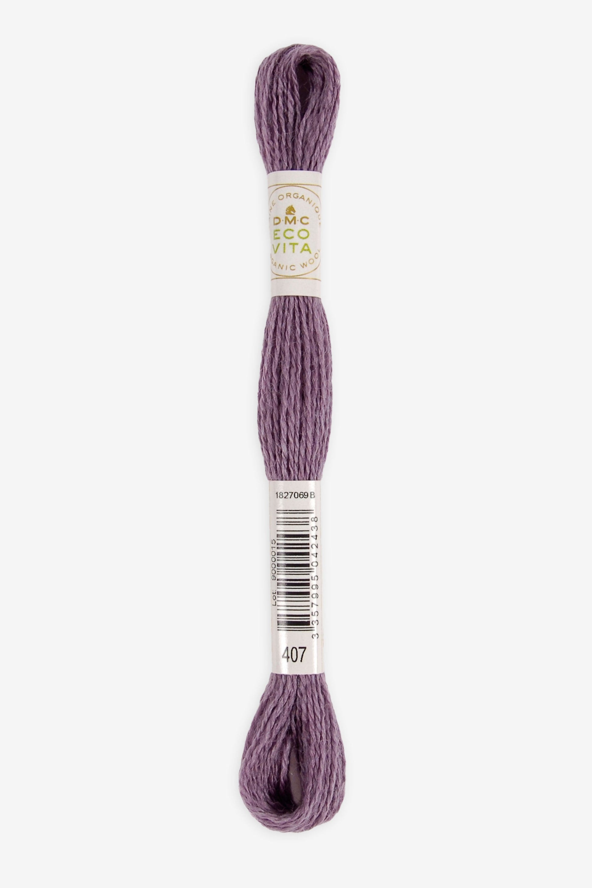 Single skein of Eco Vita Crewel Wool thread from DMC in color #407 against a white background
