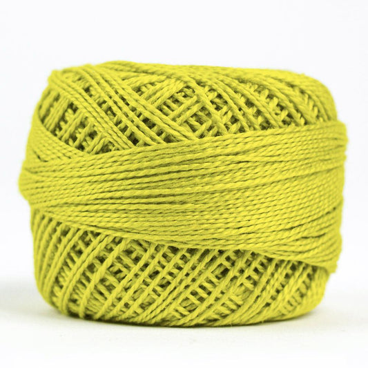 Side view of Perle cotton ball on white background to show color