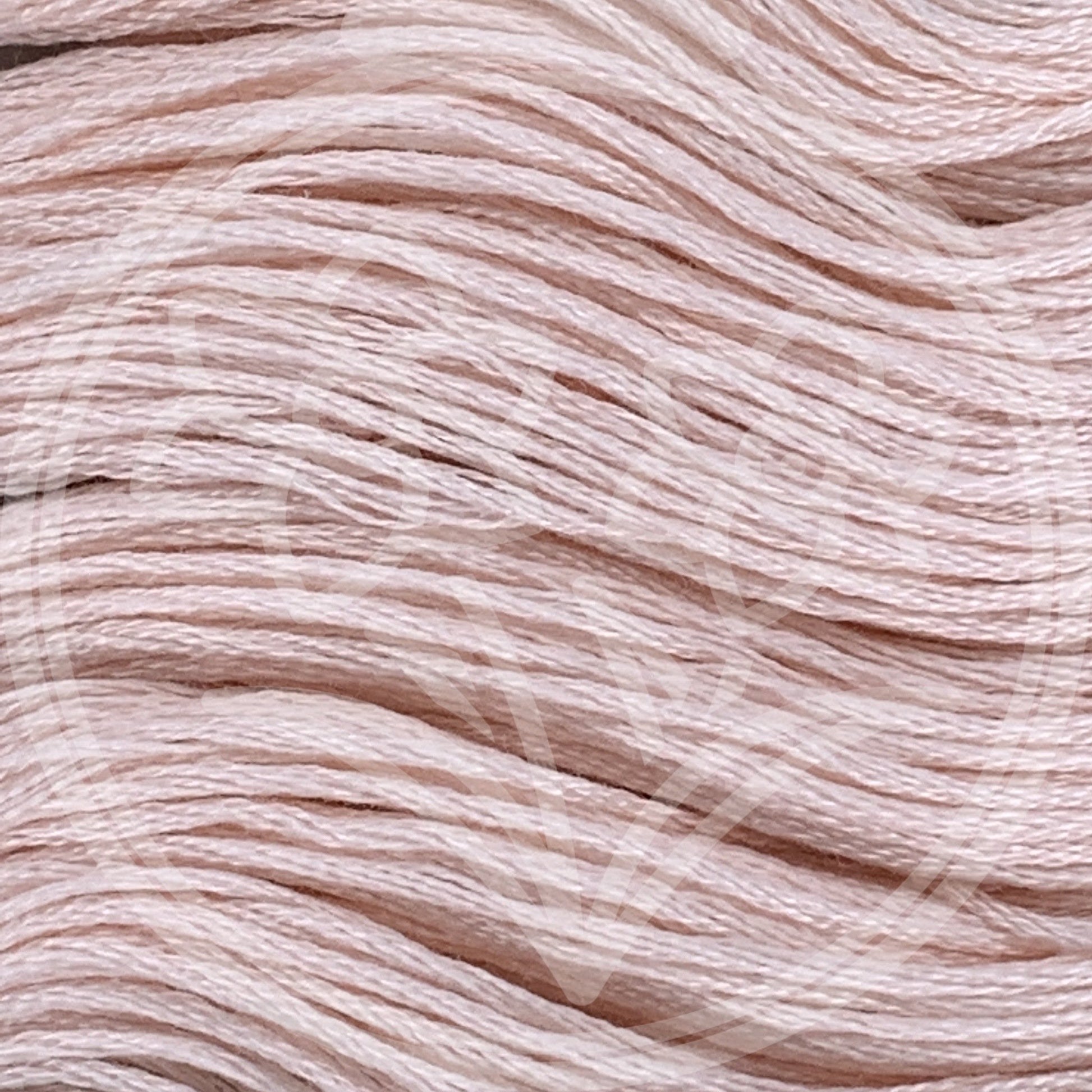 Closeup of multiple skeins, with a logo watermark