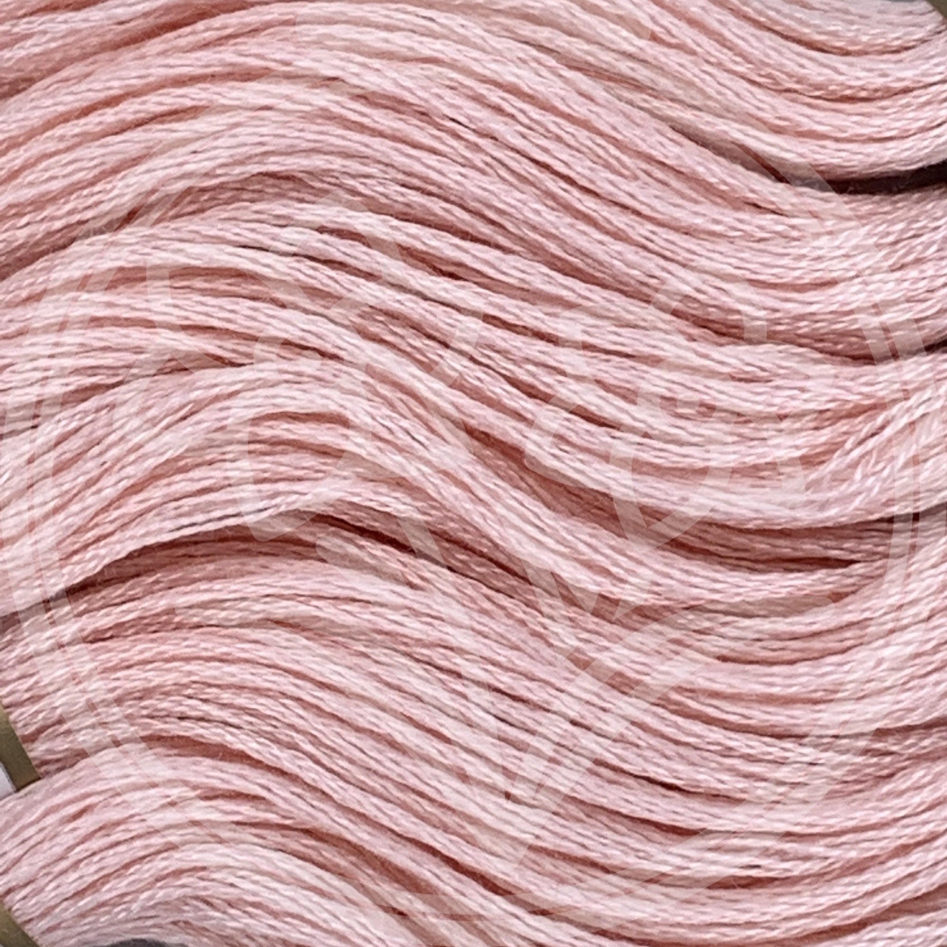 Closeup of multiple skeins, with a logo watermark