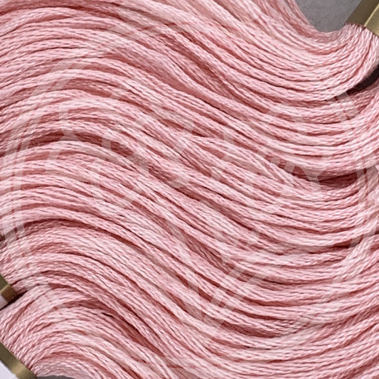 Closeup of multiple skeins, with a logo watermark