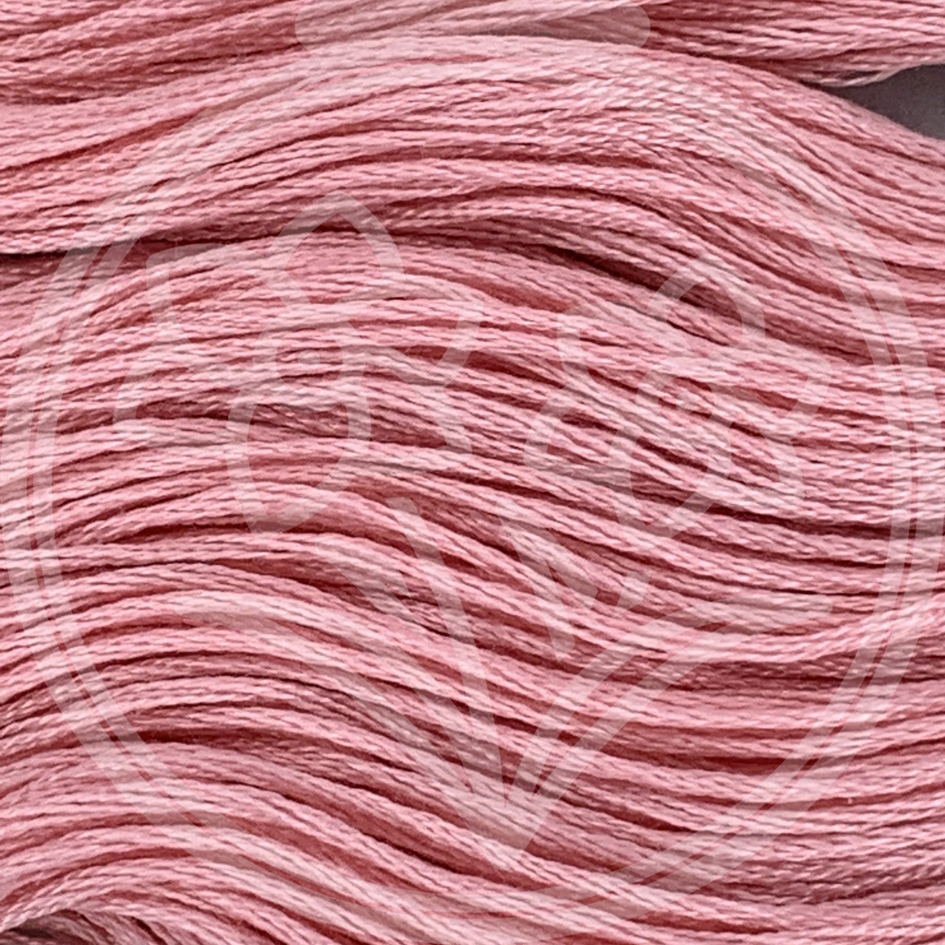 Closeup of multiple skeins, with a logo watermark