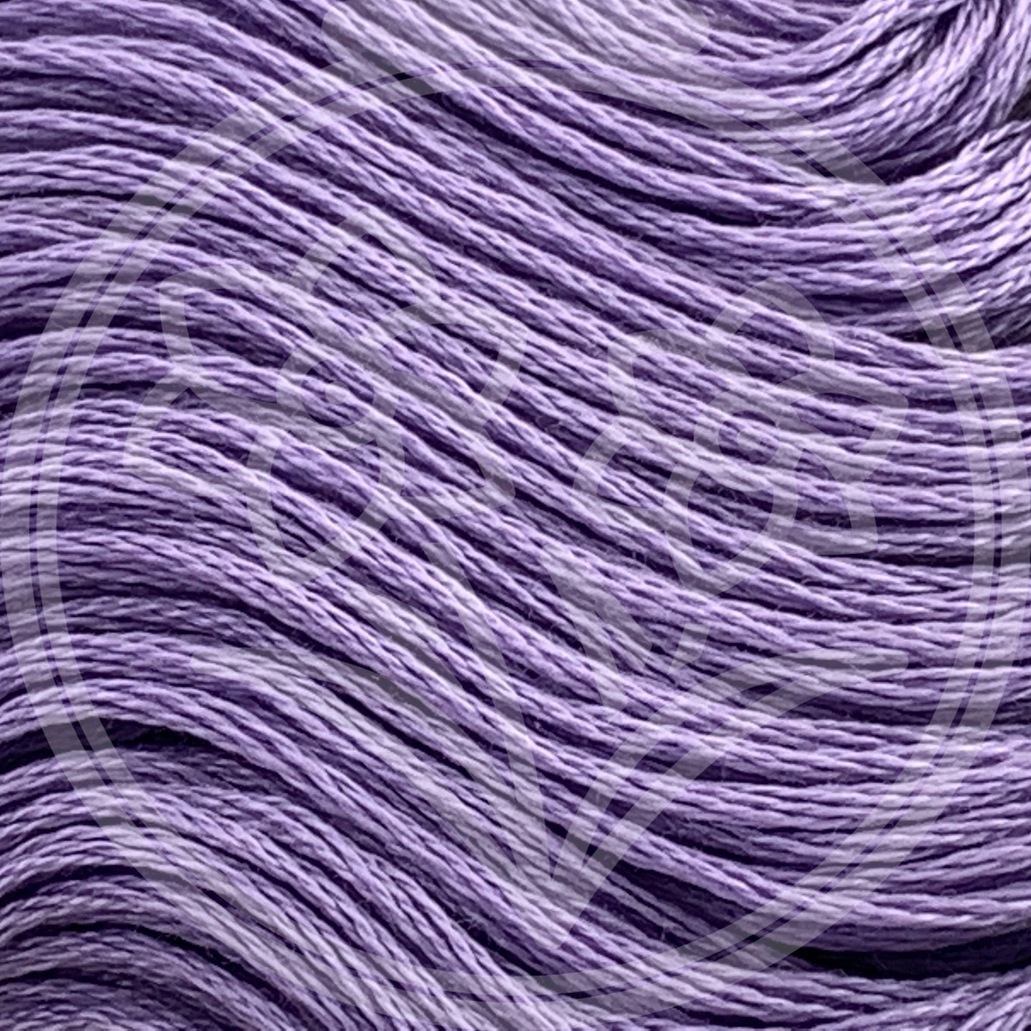 Closeup of multiple skeins, with a logo watermark