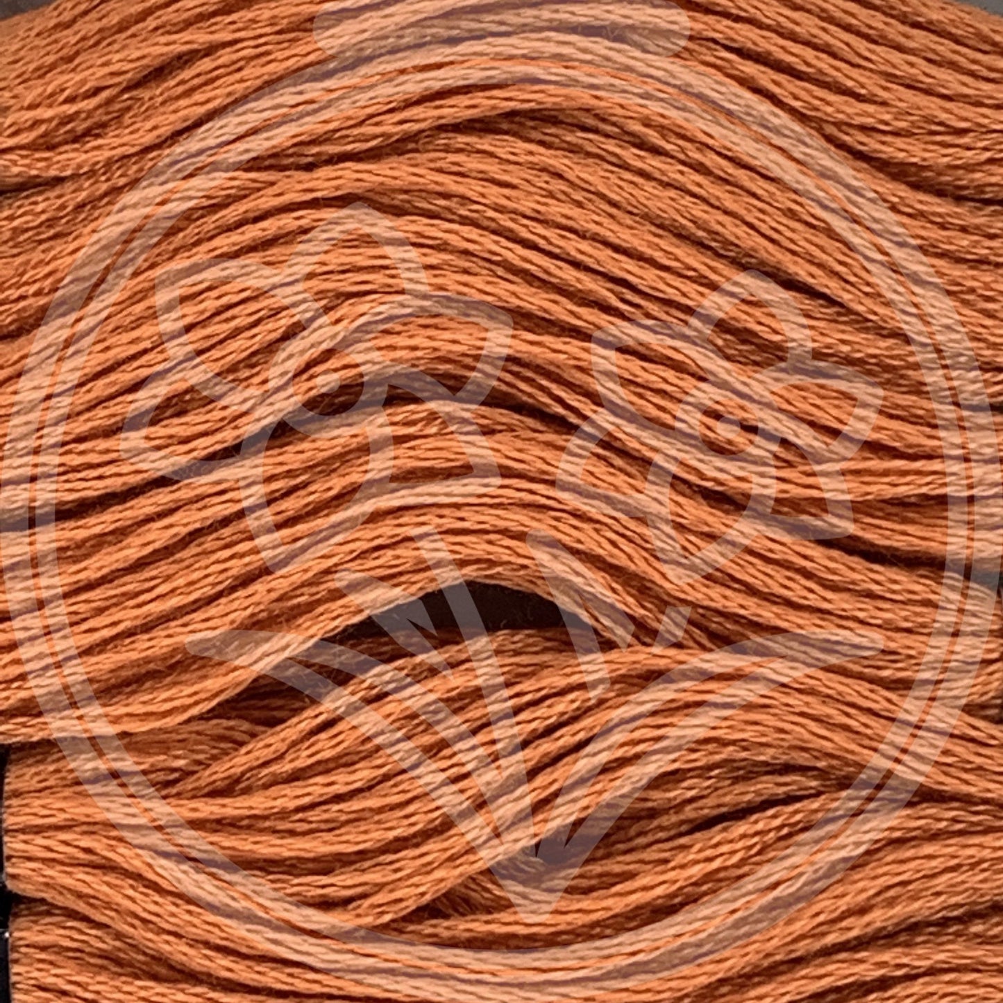 Closeup of multiple skeins, with a logo watermark