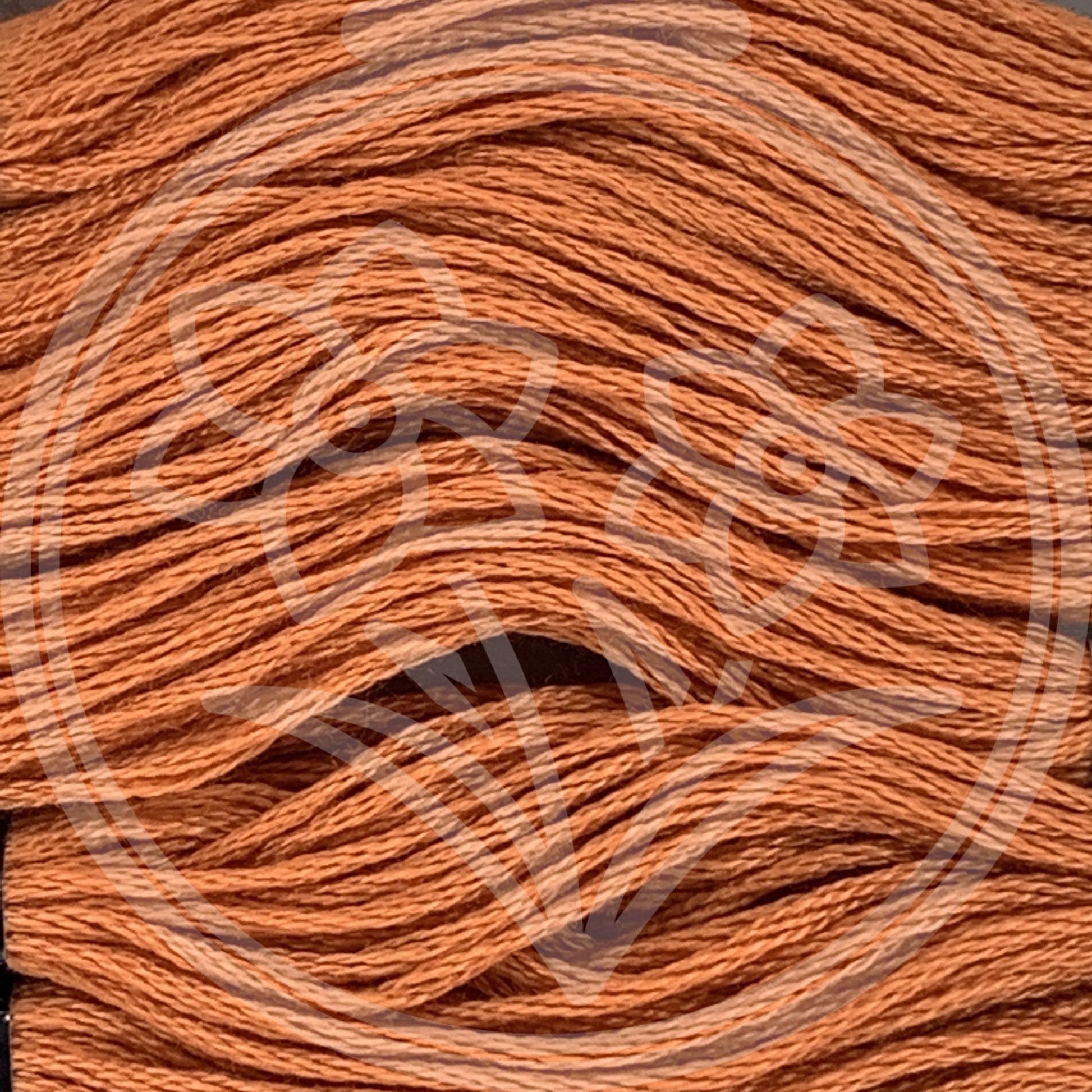 Closeup of multiple skeins, with a logo watermark