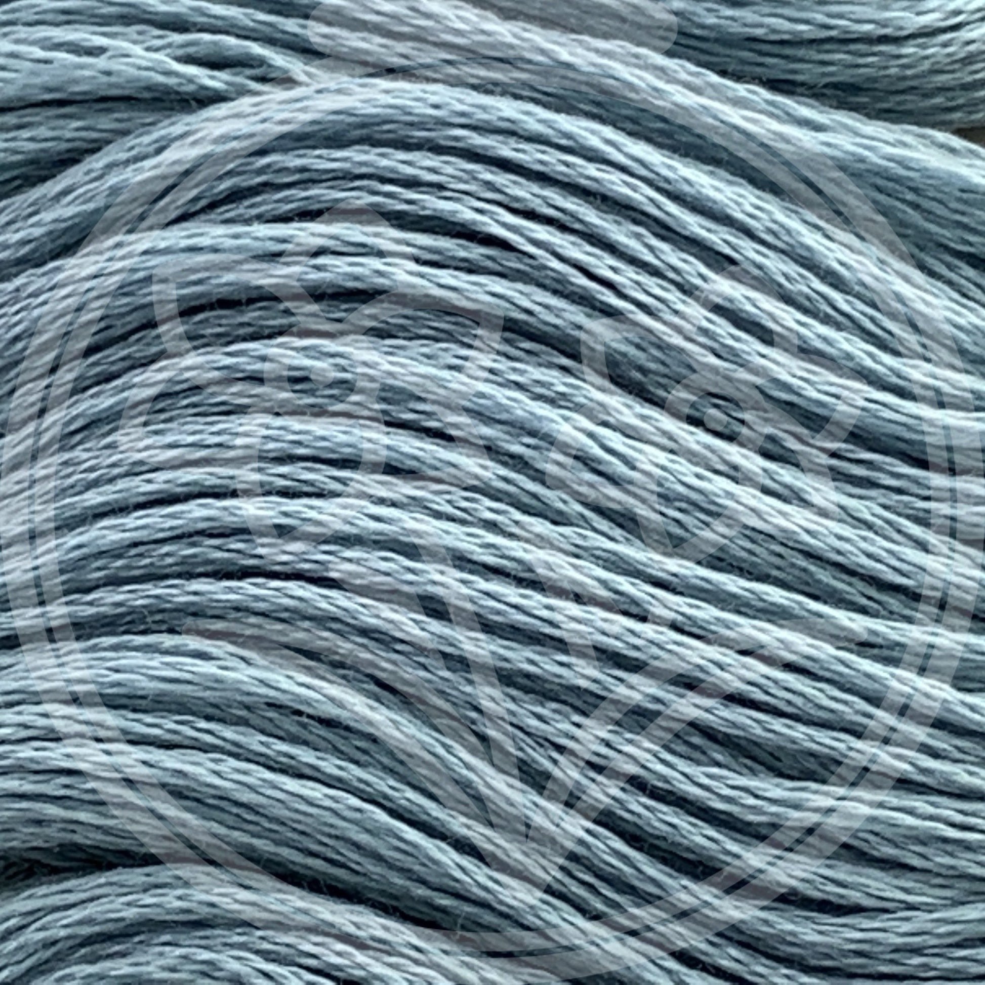 Closeup of multiple skeins, with a logo watermark