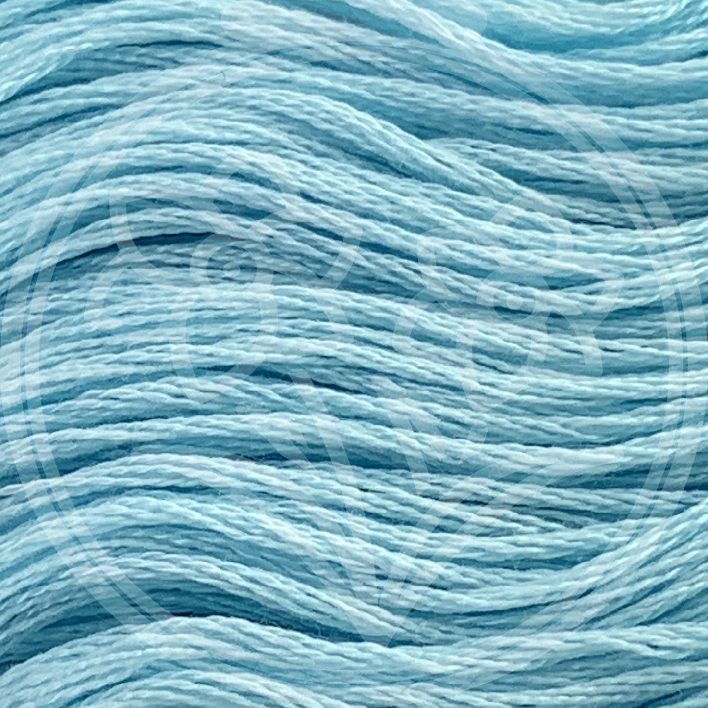 Closeup of multiple skeins, with a logo watermark