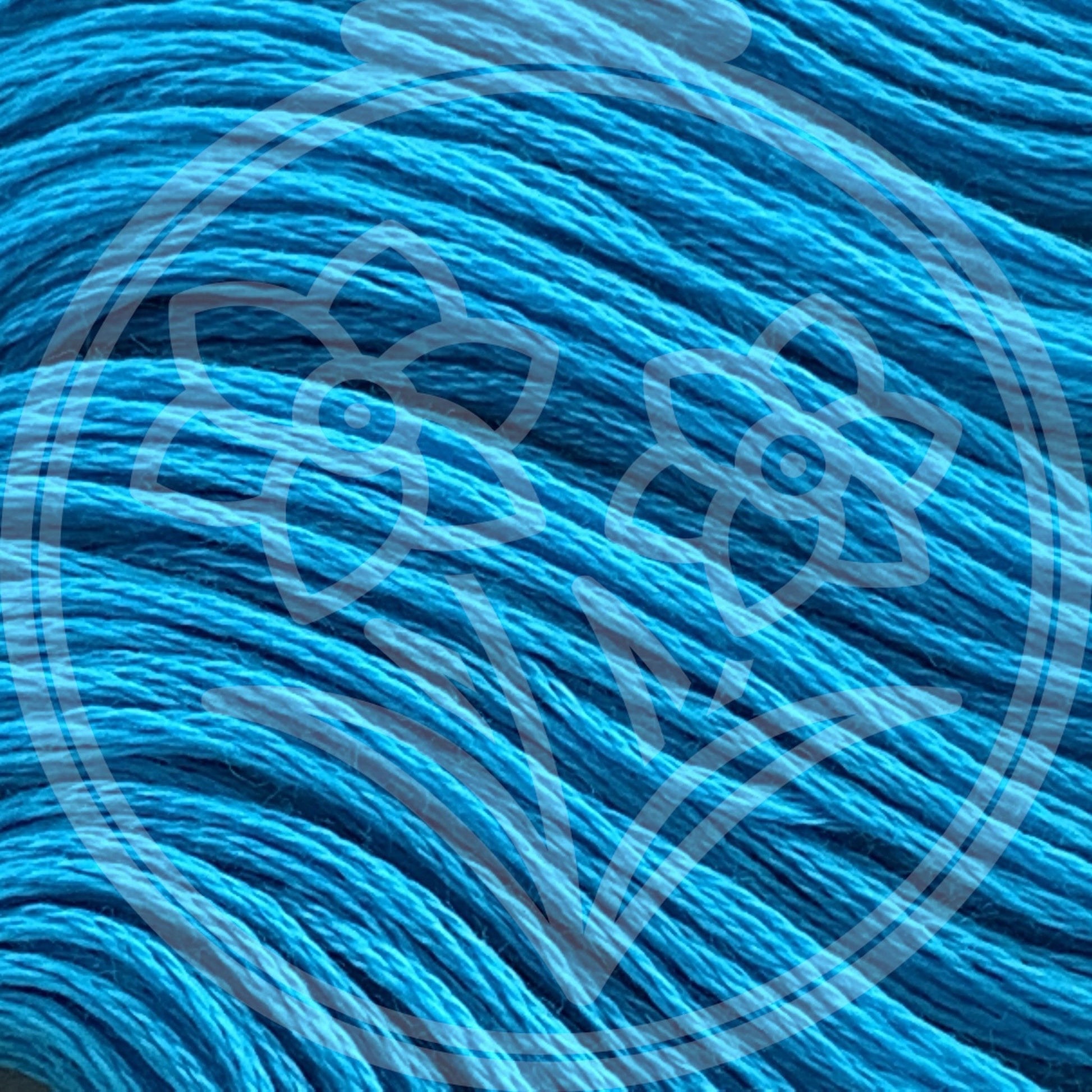 Closeup of multiple skeins, with a logo watermark