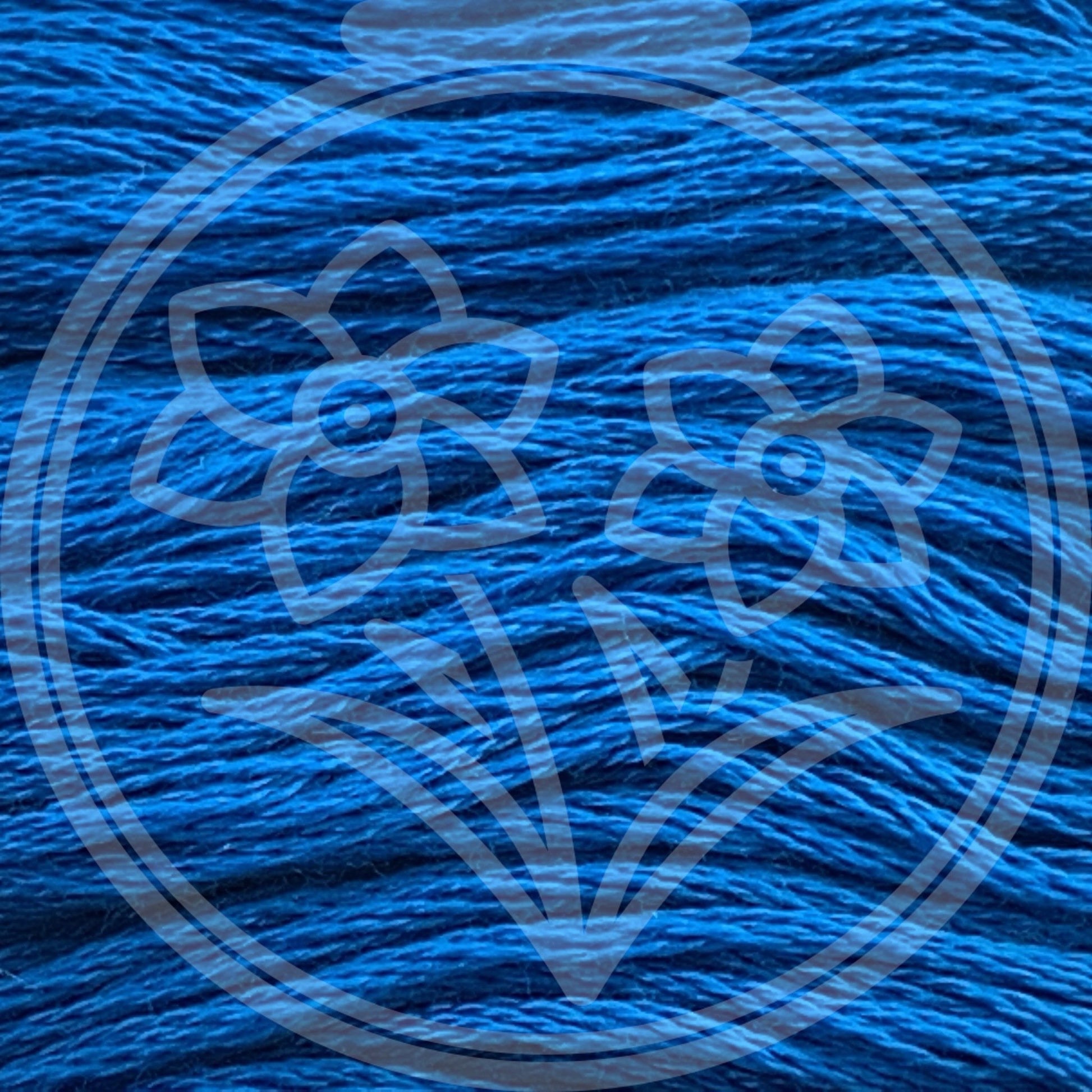 Closeup of multiple skeins, with a logo watermark