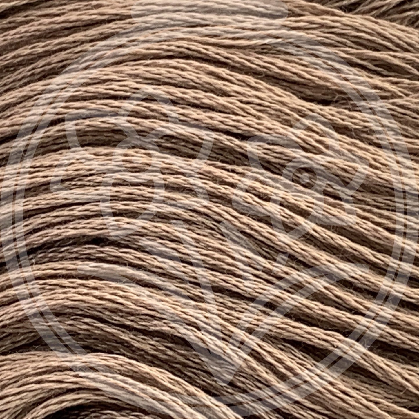 Closeup of multiple skeins, with a logo watermark