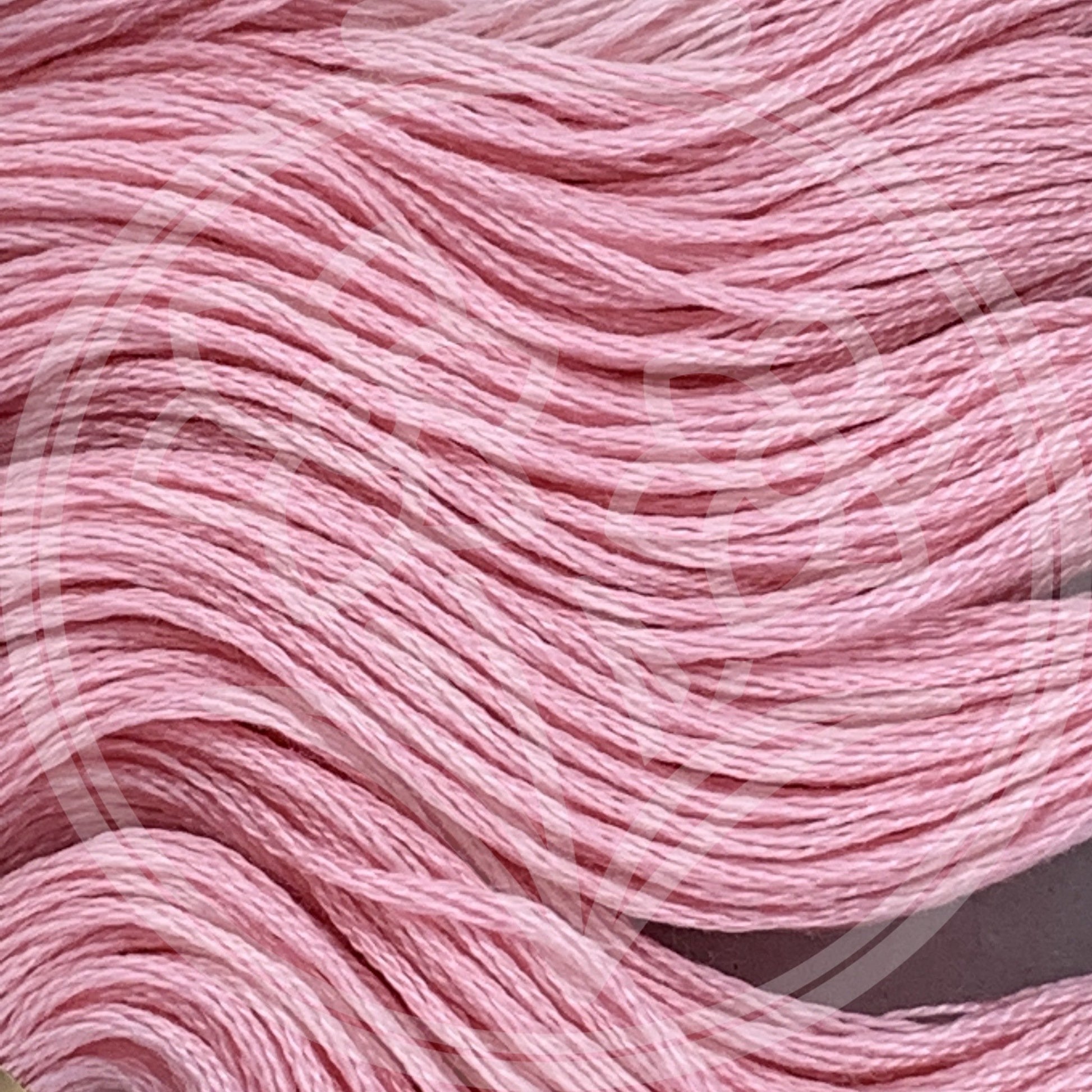 Closeup of multiple skeins, with a logo watermark