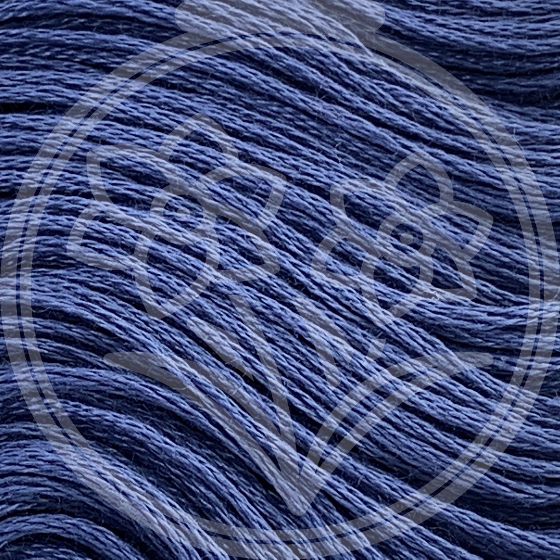 Closeup of multiple skeins, with a logo watermark