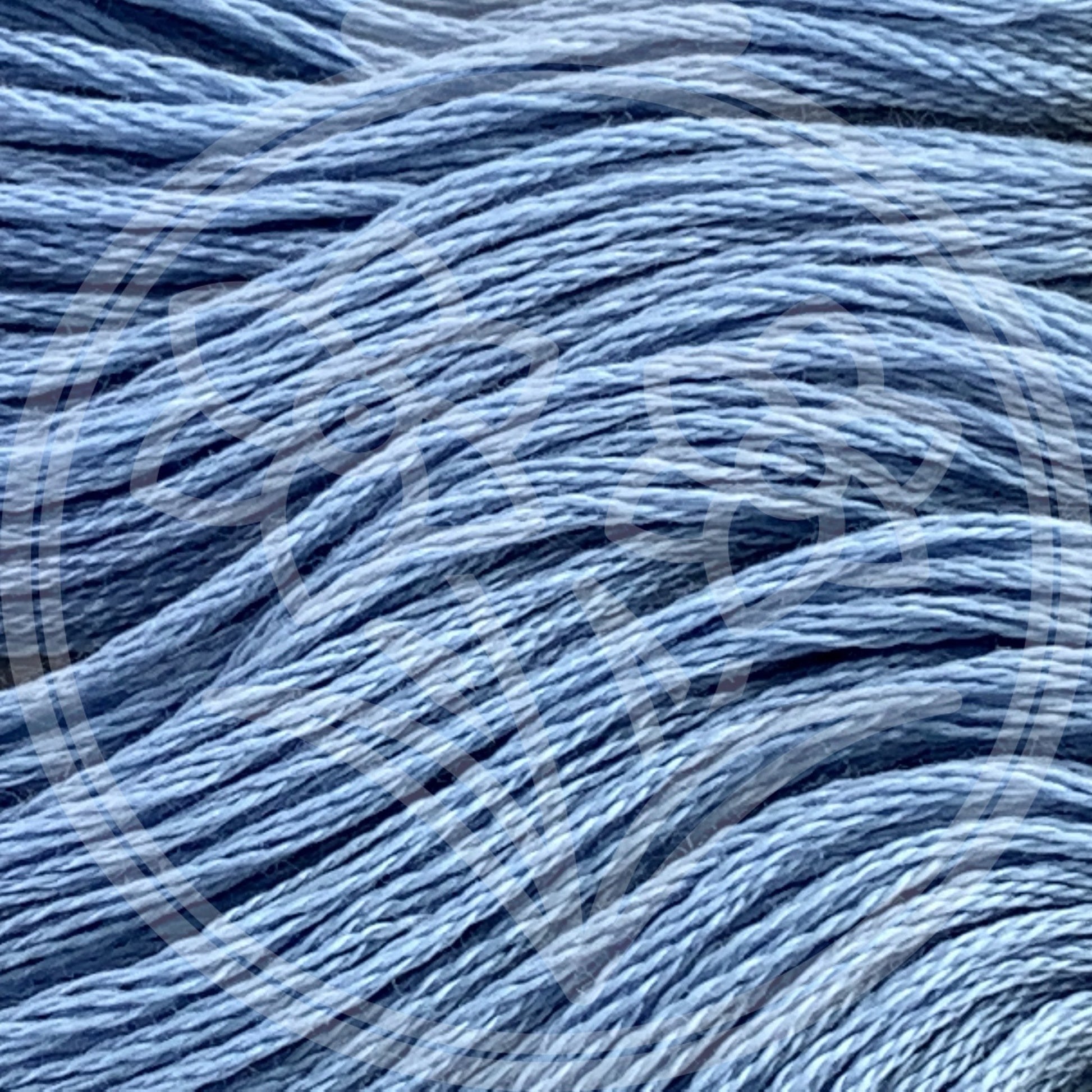 Closeup of multiple skeins, with a logo watermark