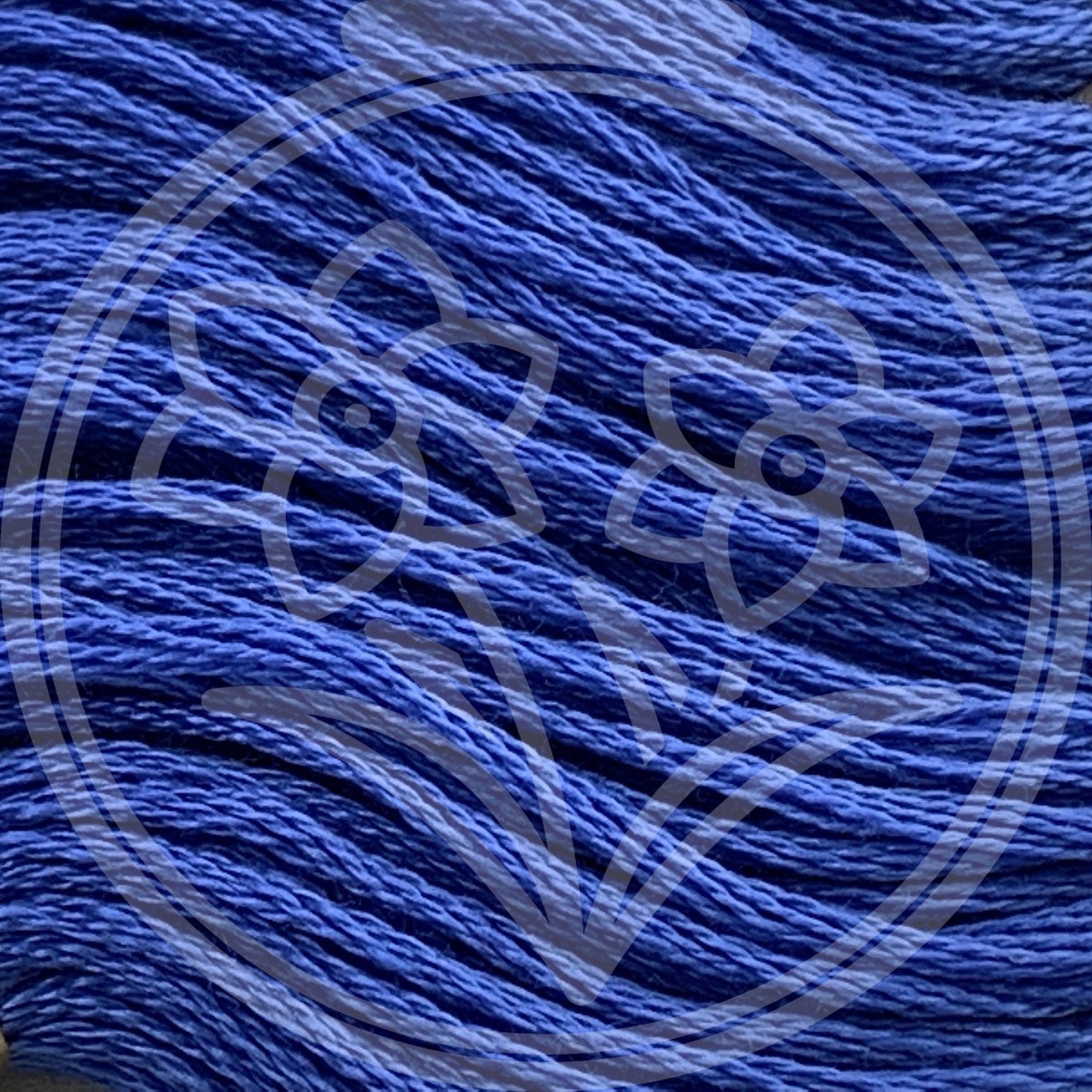 Closeup of multiple skeins, with a logo watermark