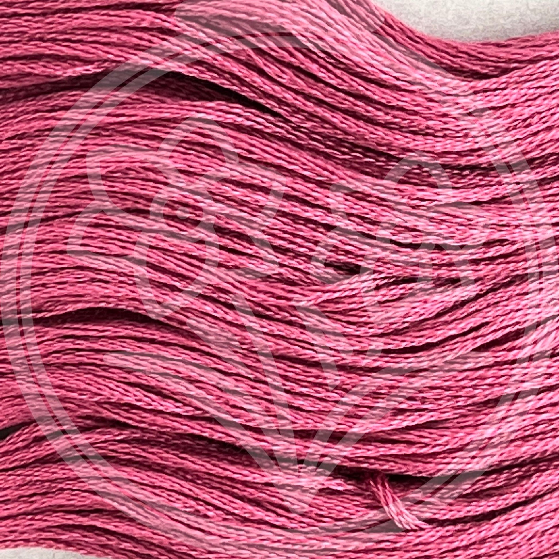 Closeup of multiple skeins, with a logo watermark