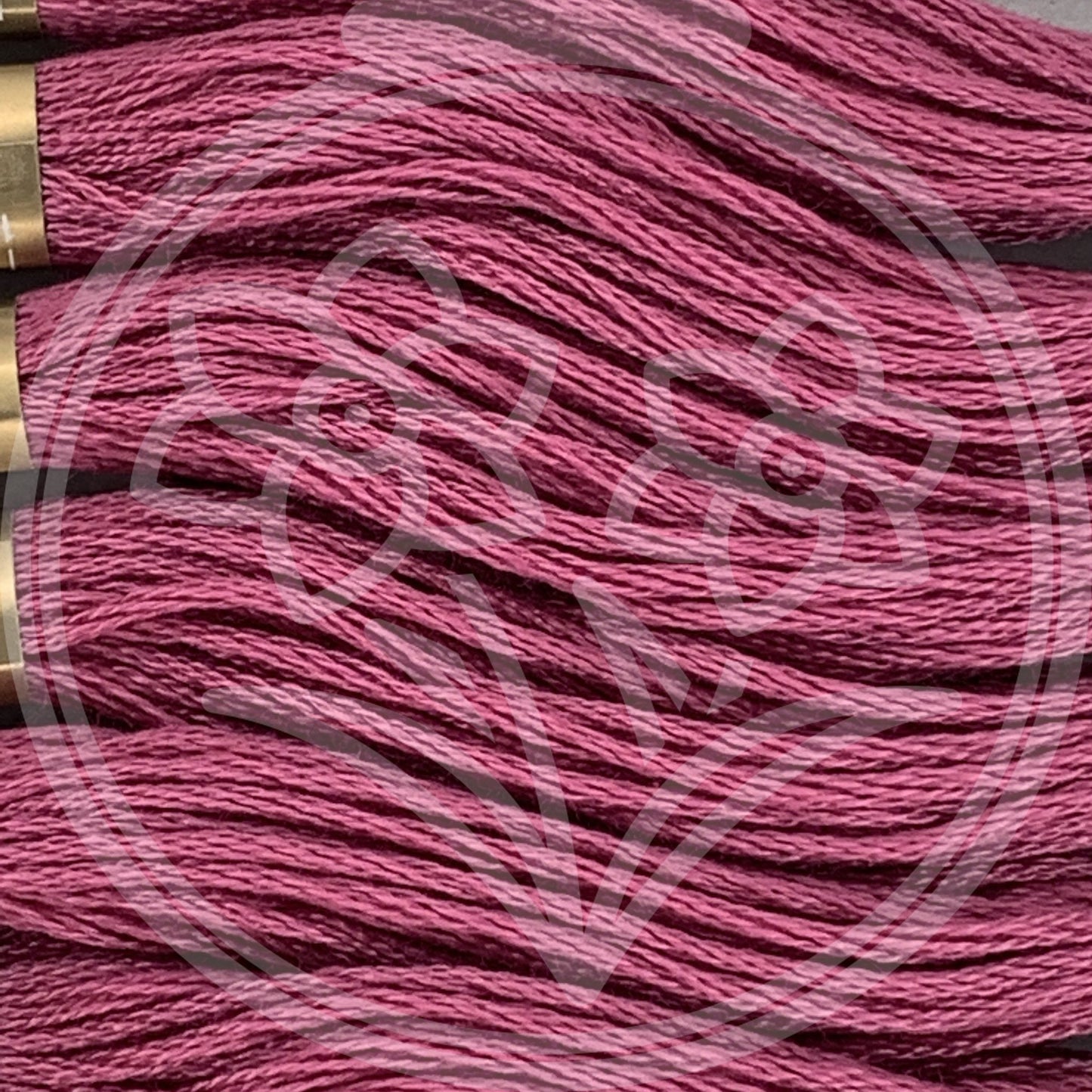 Closeup of multiple skeins, with a logo watermark