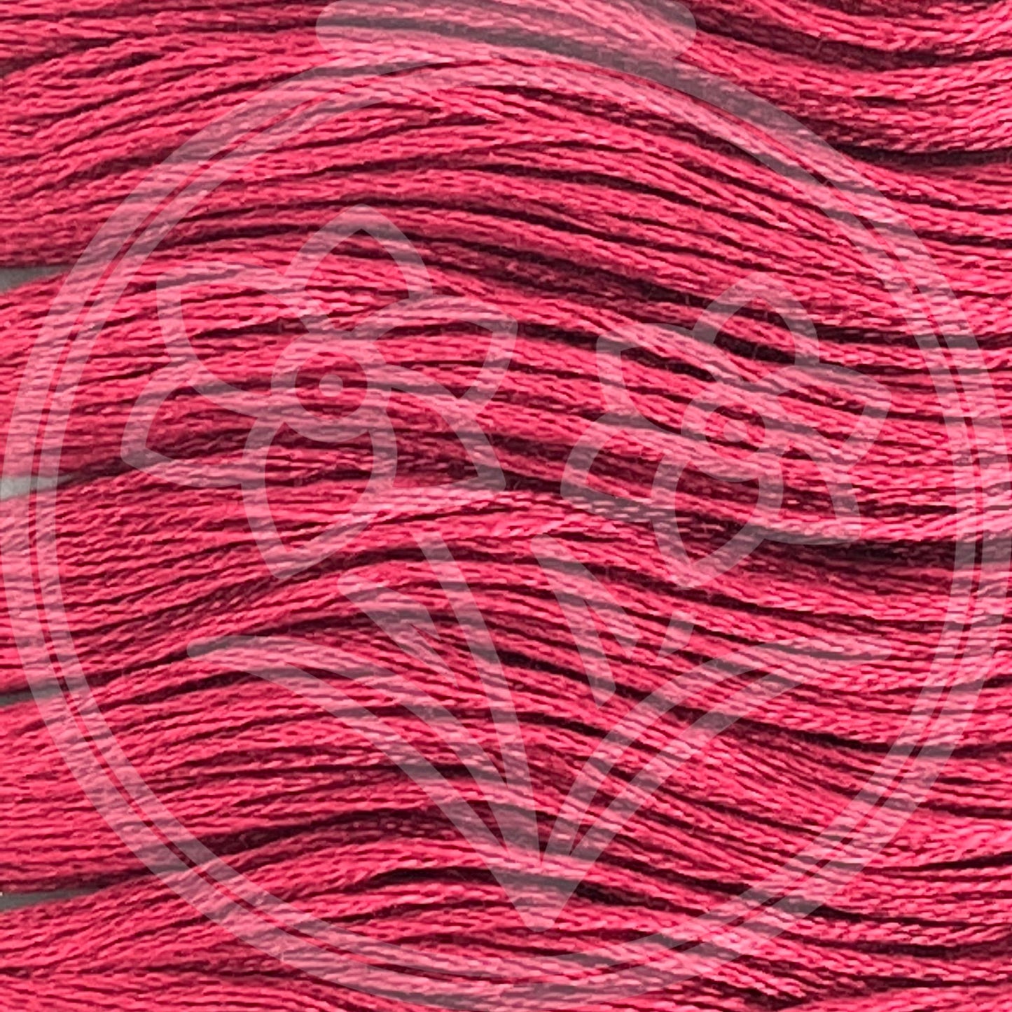 Closeup of multiple skeins, with a logo watermark