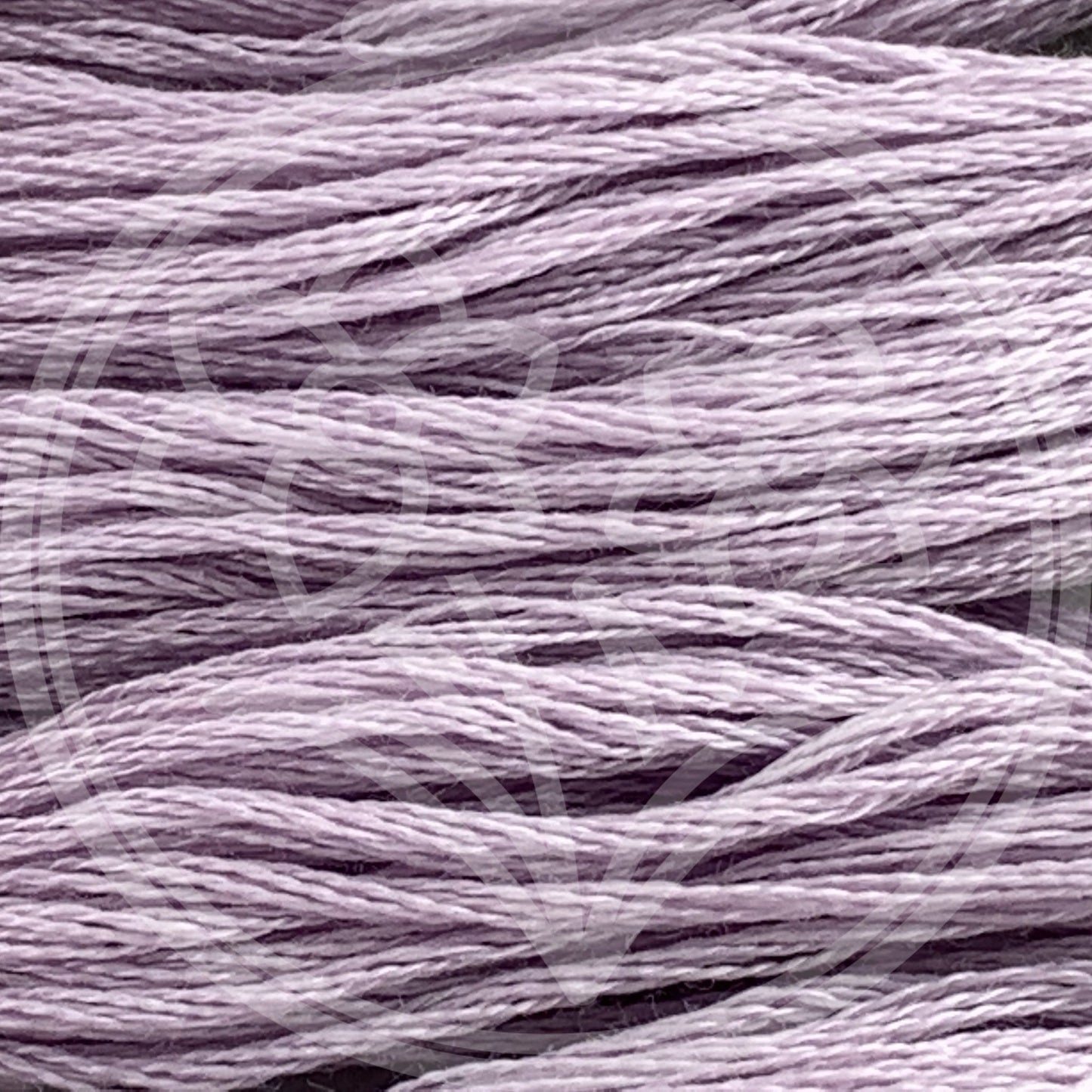 Closeup of multiple skeins, with a logo watermark