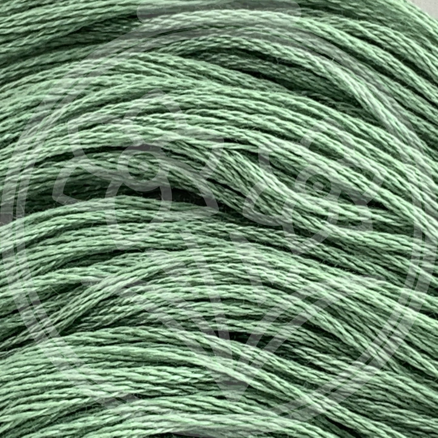 Closeup of multiple skeins, with a logo watermark
