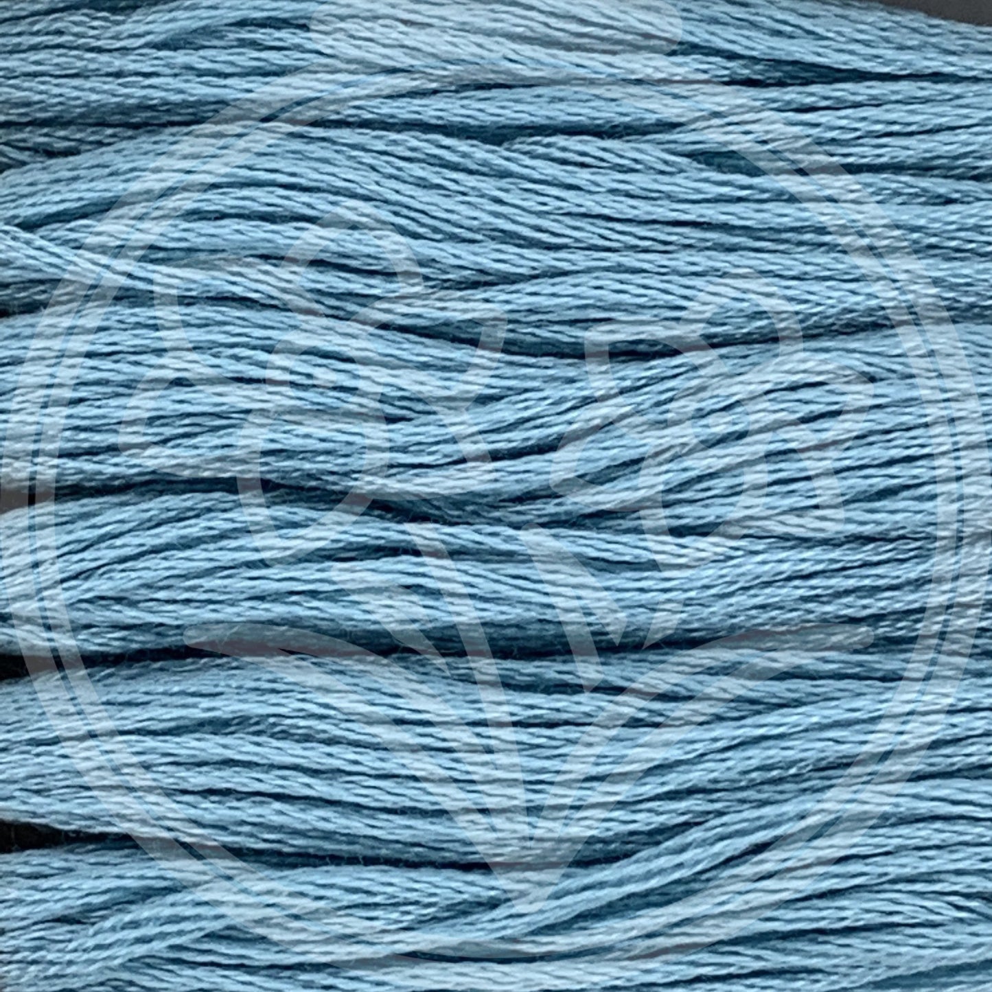 Closeup of multiple skeins, with a logo watermark